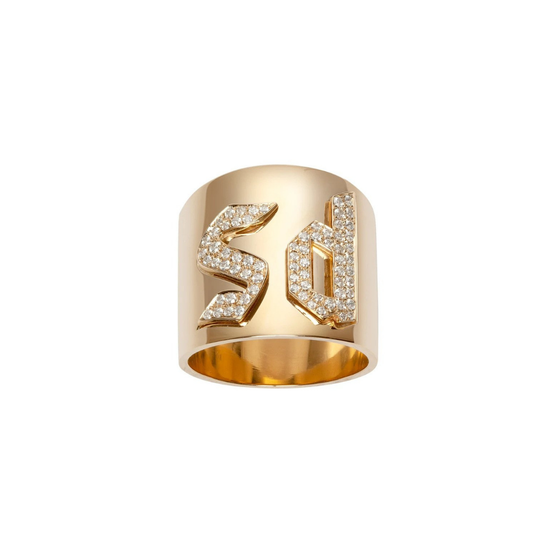 Jennifer Fisher two-letter gothic cigar band ring in 14k yellow gold, $8,595 at Jennifer Fisher