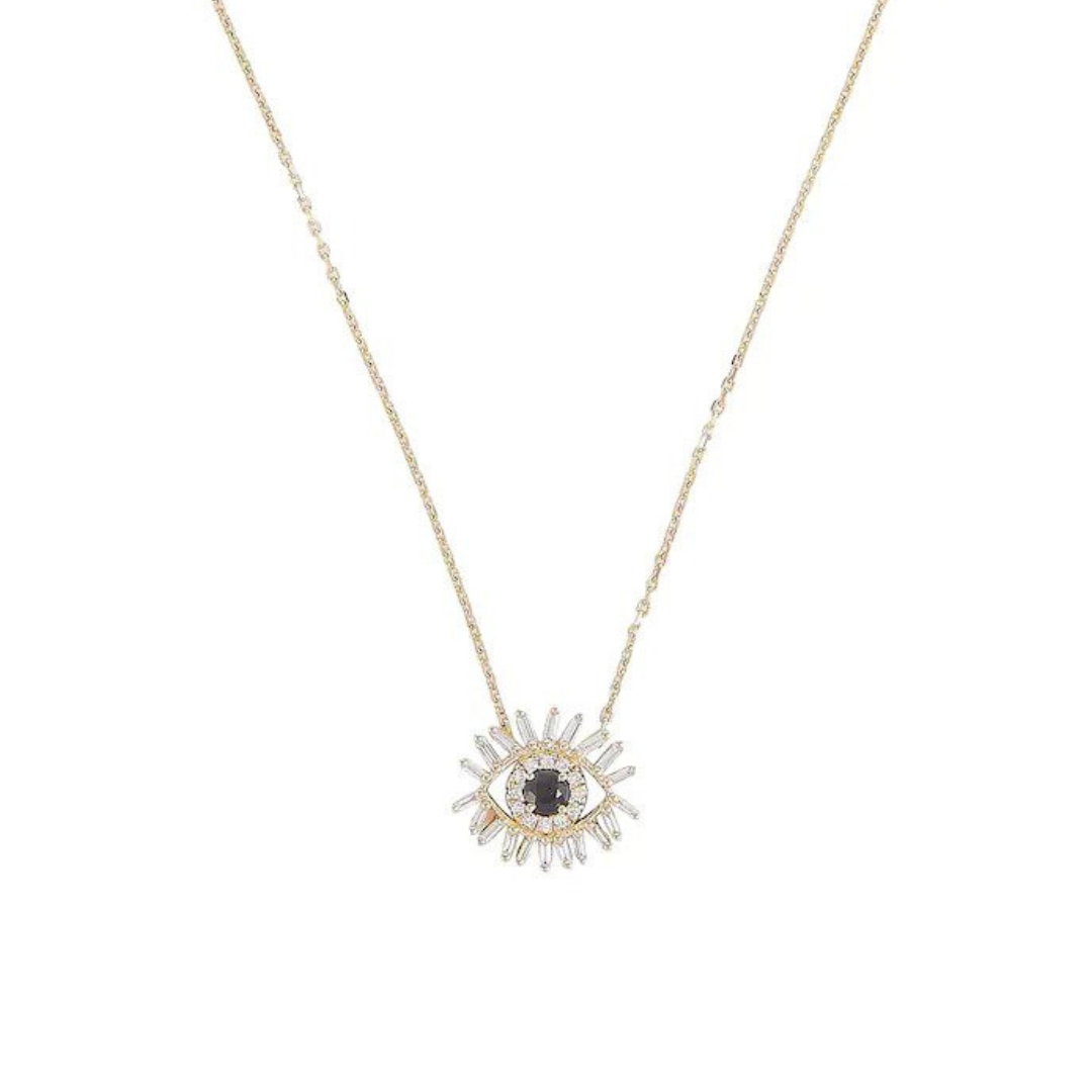 Suzanne Kalan “Evil Eye” necklace in 18k gold with sapphire and diamonds, $1,655 at Mytheresa