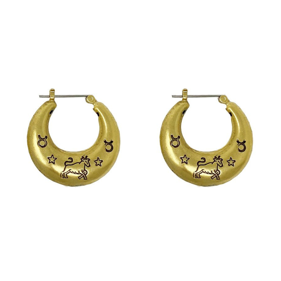Candy Shop Vintage “Zodiac” earrings in 14k gold, $58 at Candy Shop Vintage