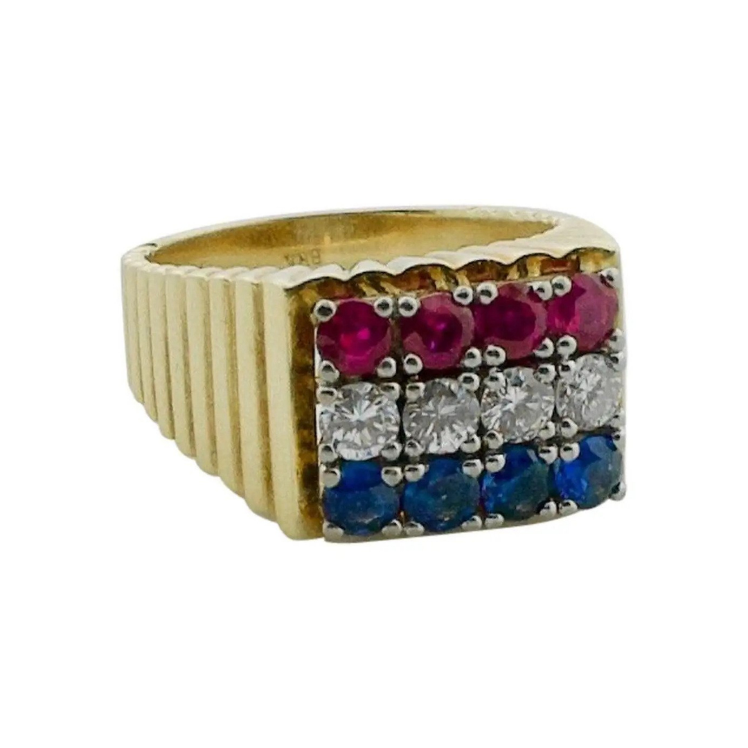 Vintage ring in 18k gold with diamonds, sapphires, and rubies, $3,300 at 1stDibs