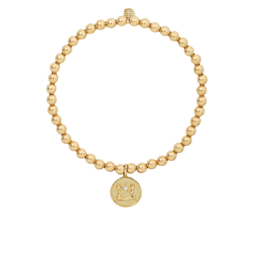 Sydney Evan "Gemini" bracelet in 14k gold with diamond, $895 at Net-a-Porter