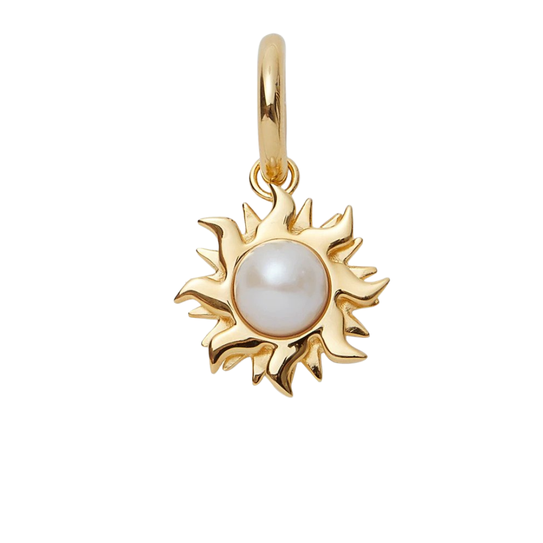 Lela Sadoughi Charmed by Lele Pearl "Pearl Sun" charm with freshwater pearl, $125 at Lela Sadoughi
