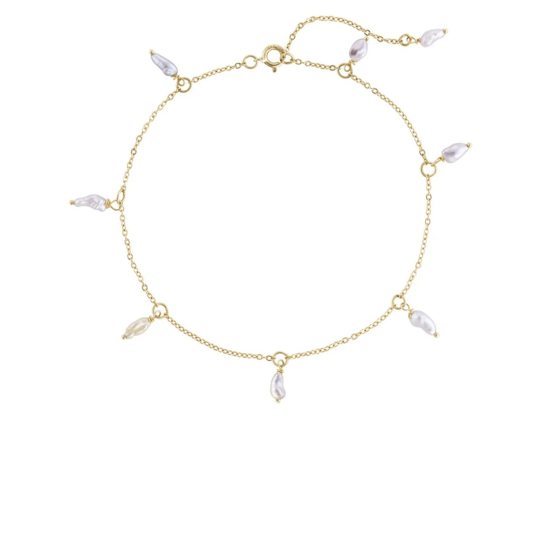White/Space “Pebble Pearl” bracelet in 14k yellow gold with pearls, $398 at White/Space