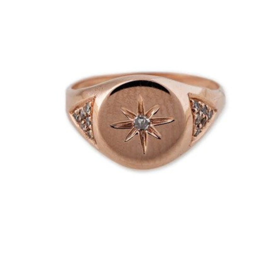 Jacquie Aiche “Round Burst” signet ring in 14k rose wold with diamonds, $1,440 at Jacquie Aiche