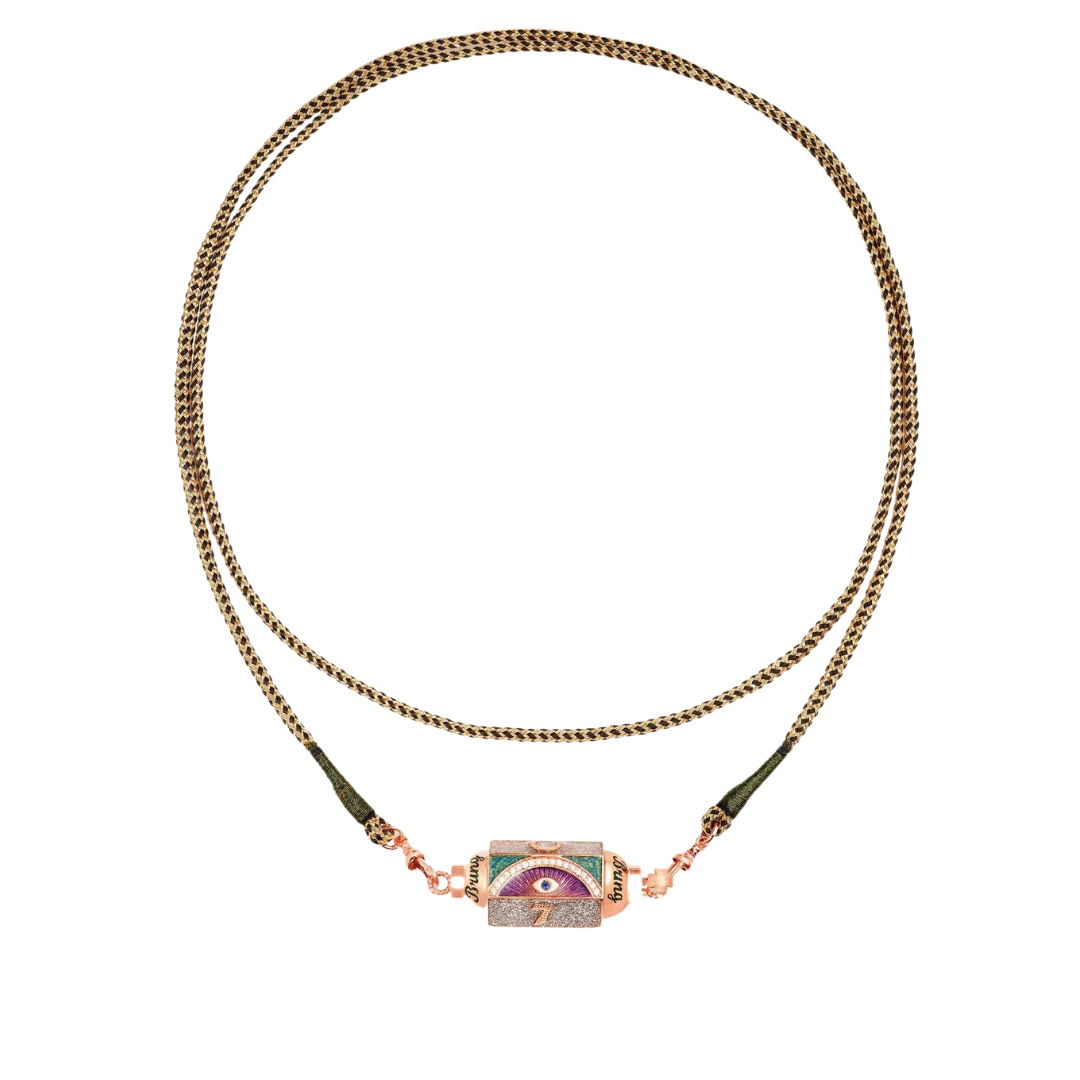 Locket “Lucky” in pink gold set with diamonds, a blue and enameled sapphire, $3,774