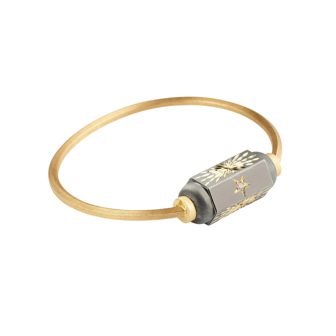 “Shining Star” bangle bracelet in yellow gold with rhodium finish, $3,111