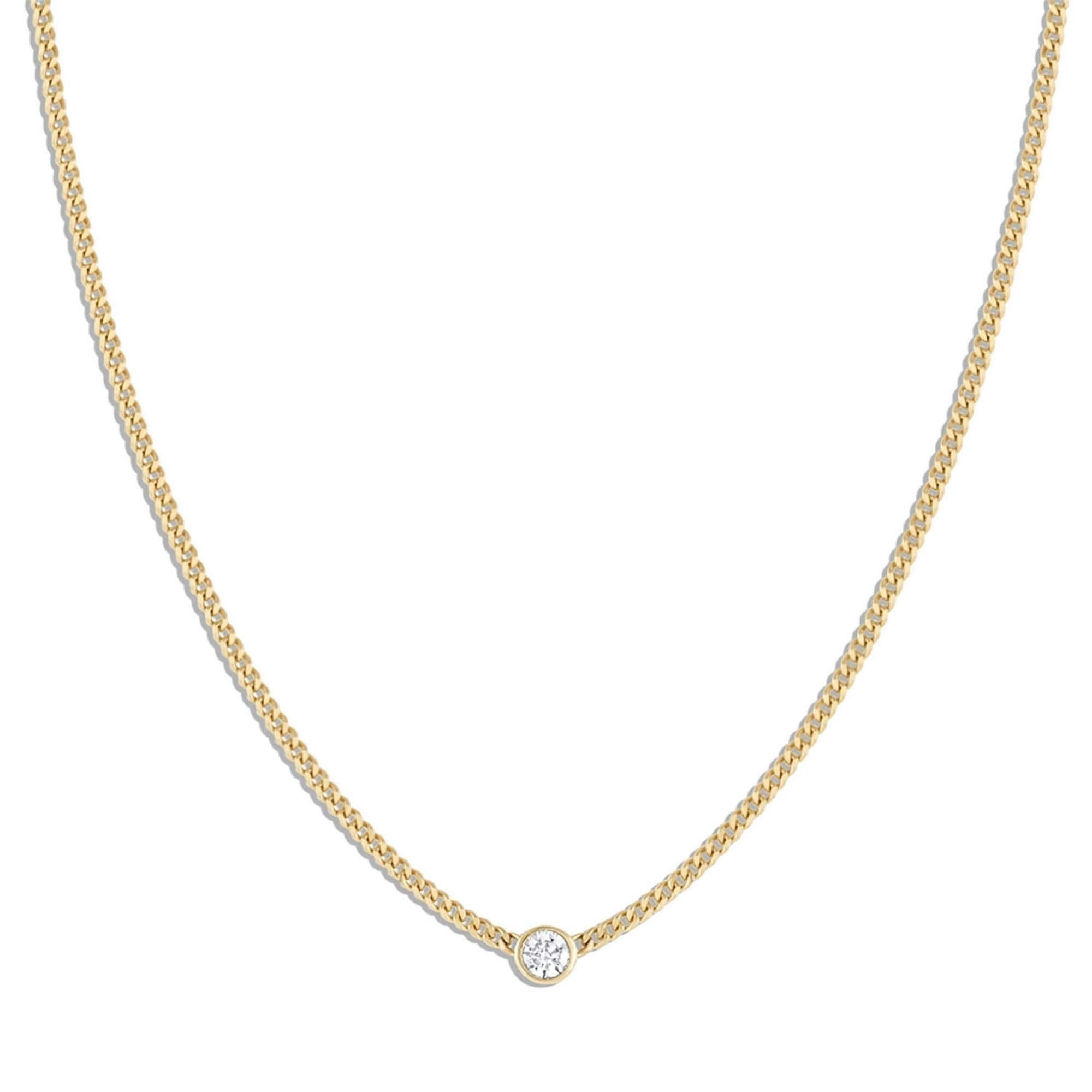 Gorjana “Wilder” necklace in 14k gold with diamond, $725 at Gorjana 