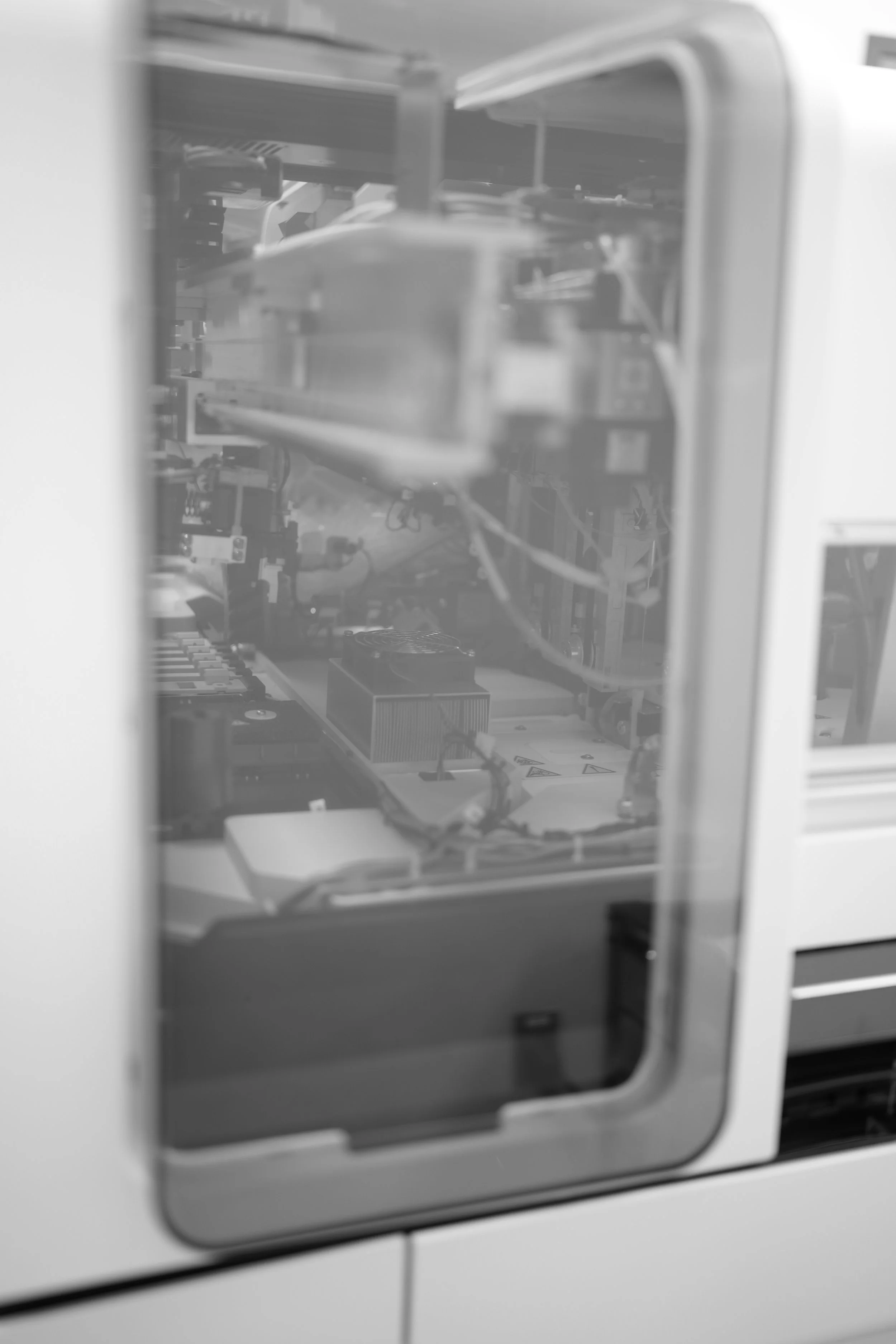 View of computer hardware components inside a desktop computer case, seen through a side window.