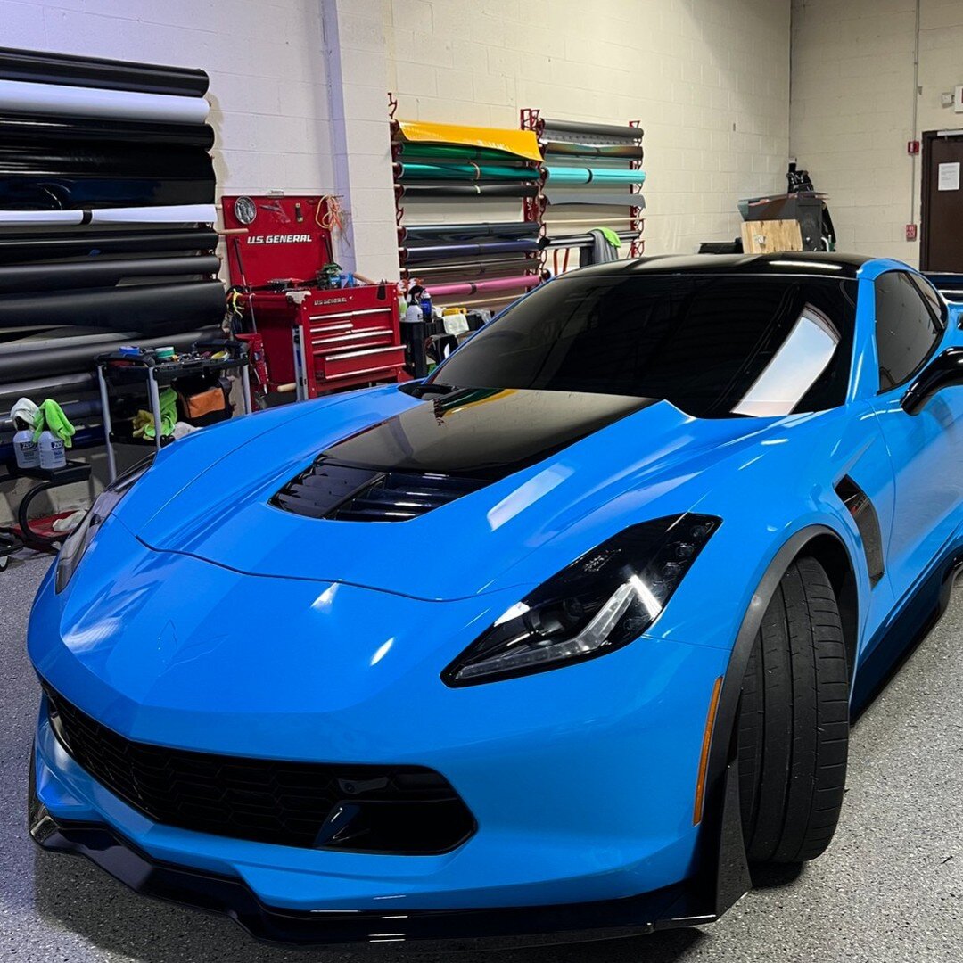 Wowza! We love the look of this Avery Gloss Light Blue wrap on our C7 Z06. It's perfect for elevating the already stunning design of the car. Let us help you make it a reality - come see us today! #AveryWrap #LightBlue #z06