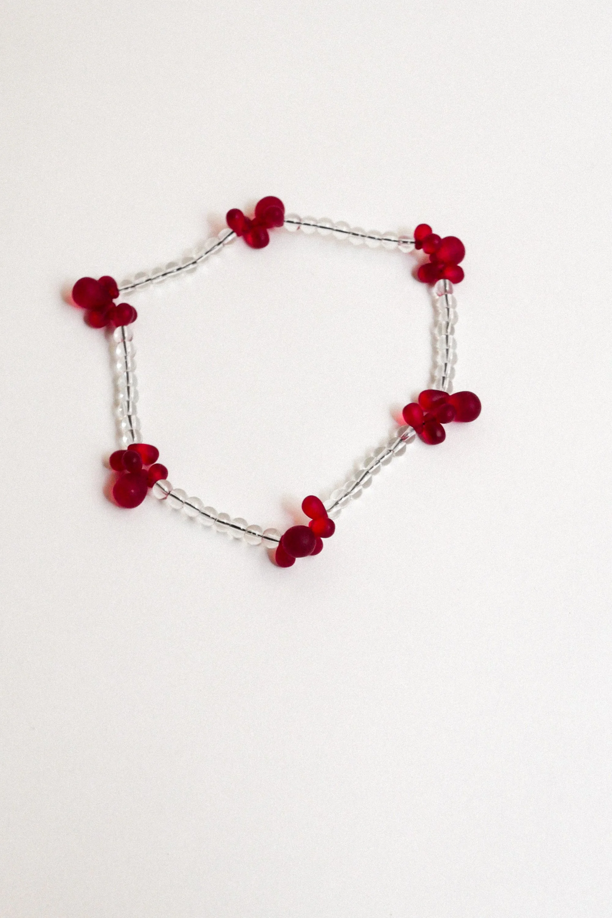 collier Bouquet transparent/rouge.