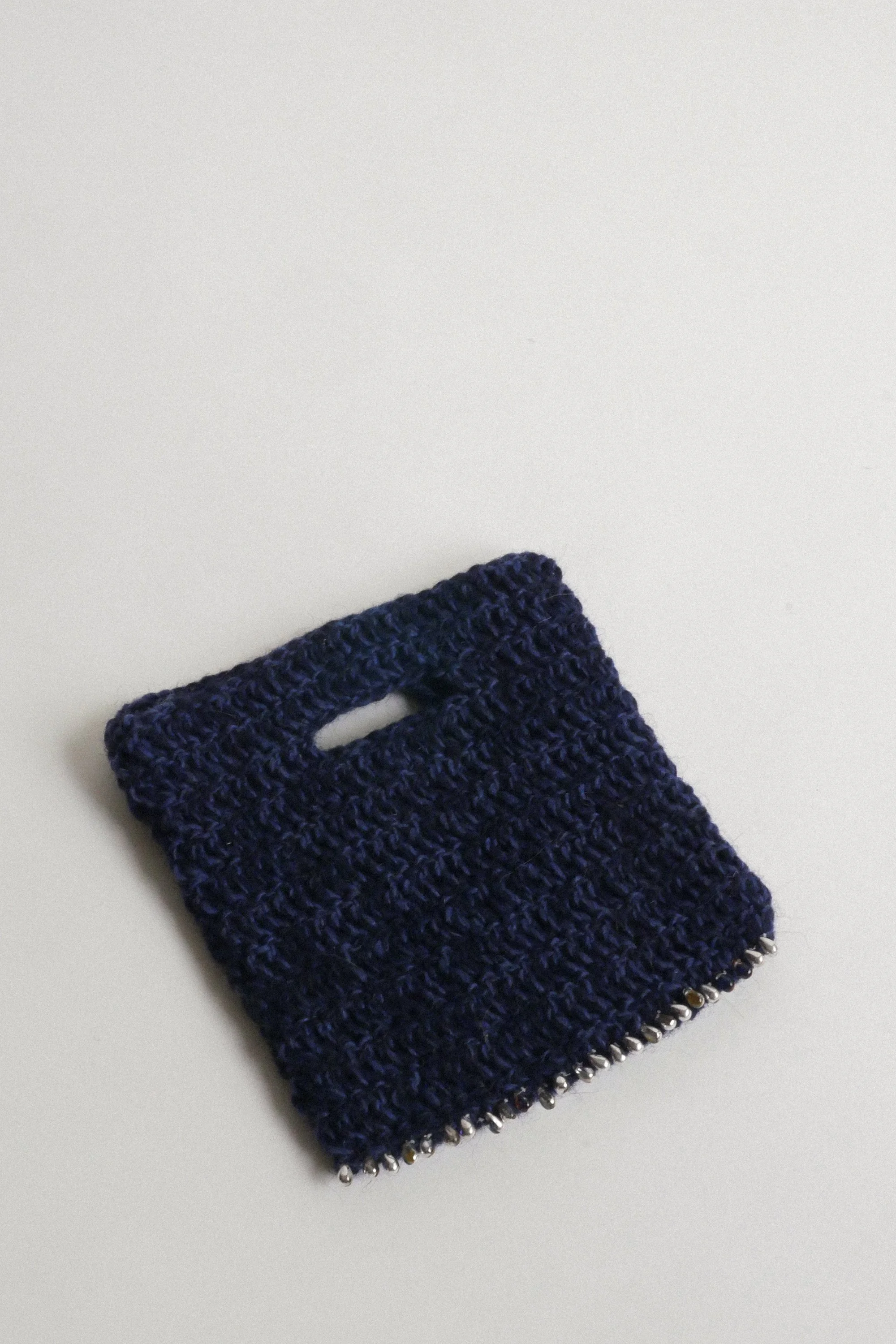 Sac en laine petit perles.