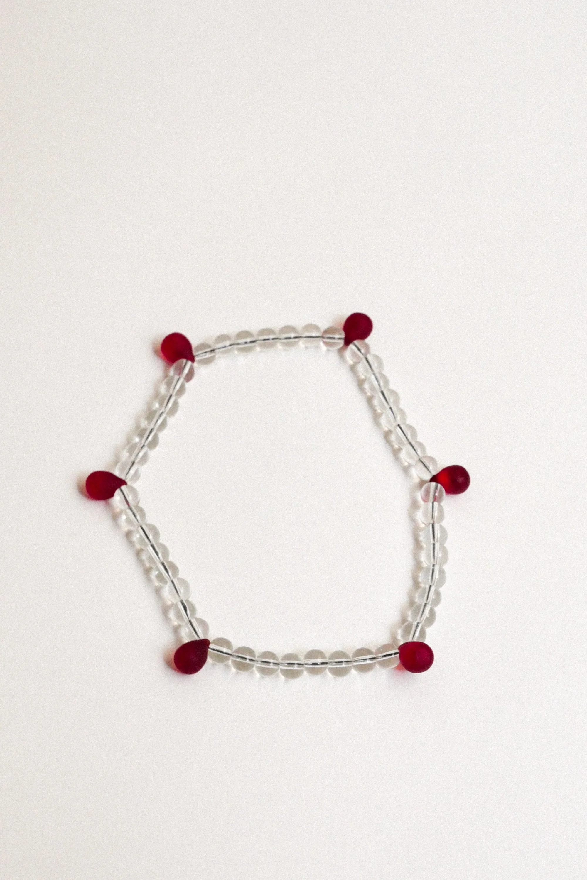 collier Goutte transparent/rouge.