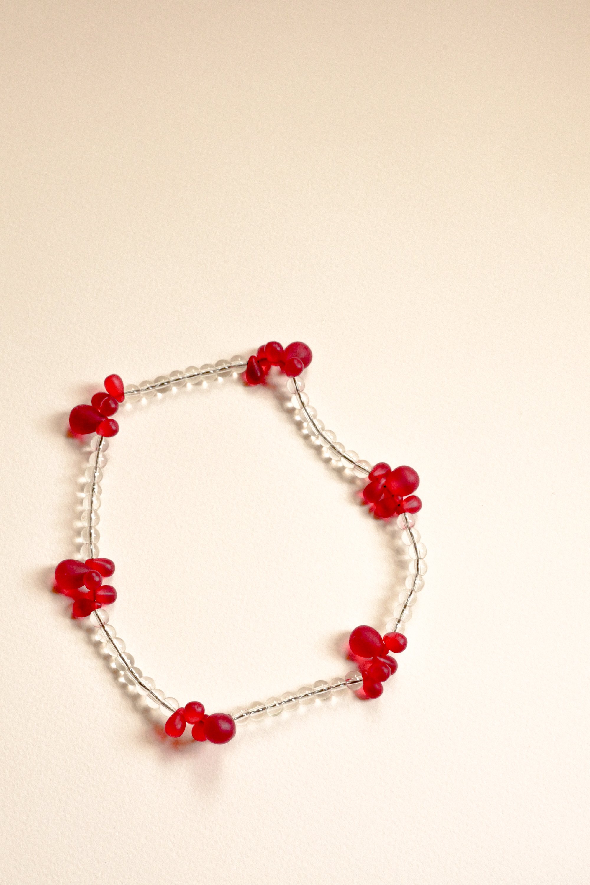 collier Bouquet transparent/rouge.