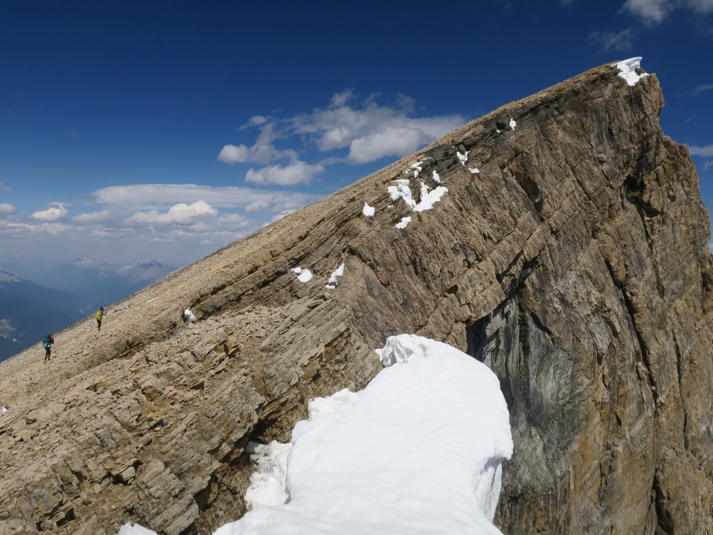 Hikers logging big miles and big vertical on one of our Day Trips\Trail Runs\Custom Trips, Jasper National Park