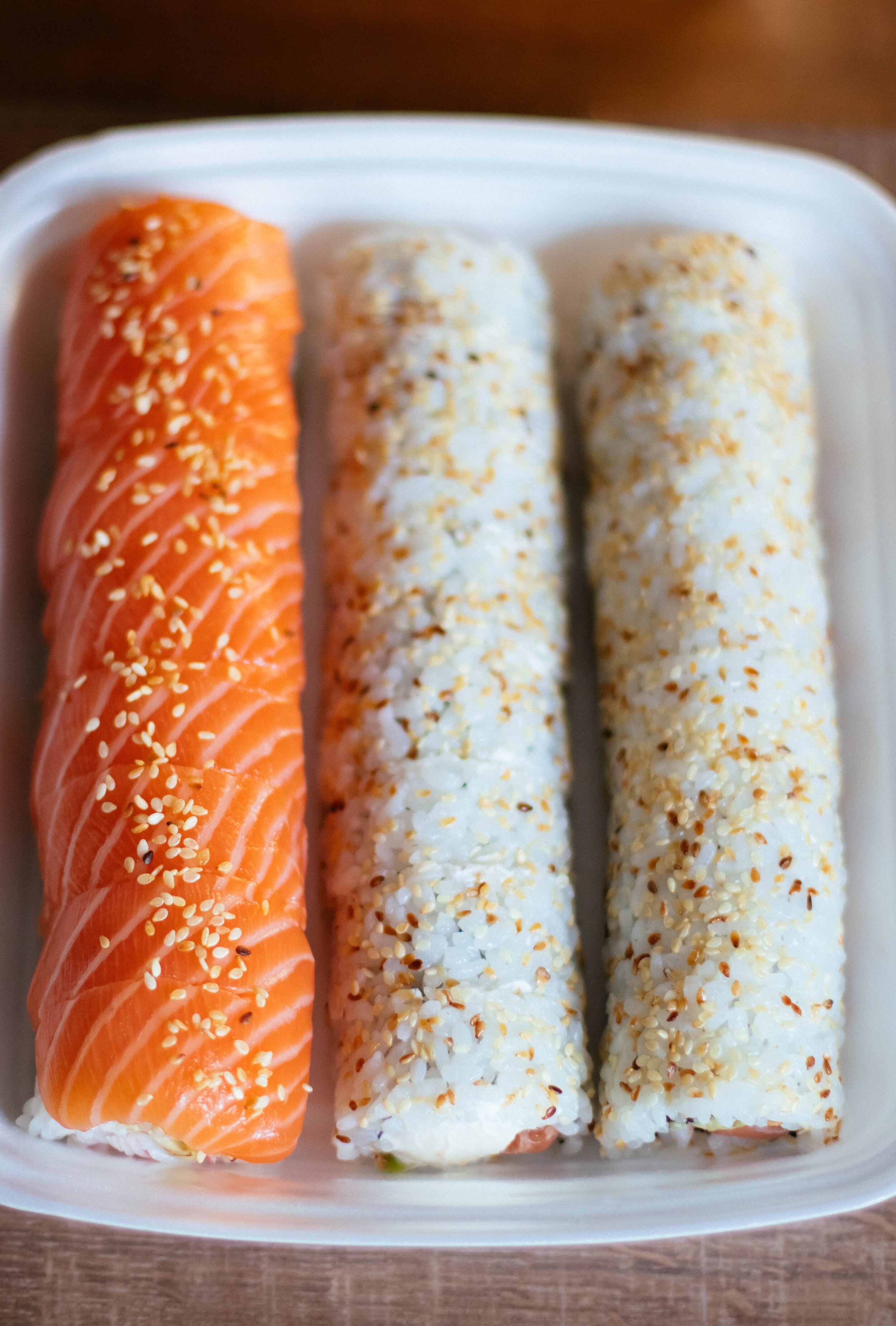 three-sushi-rolls-in-white-plastic-container-1199970.jpg