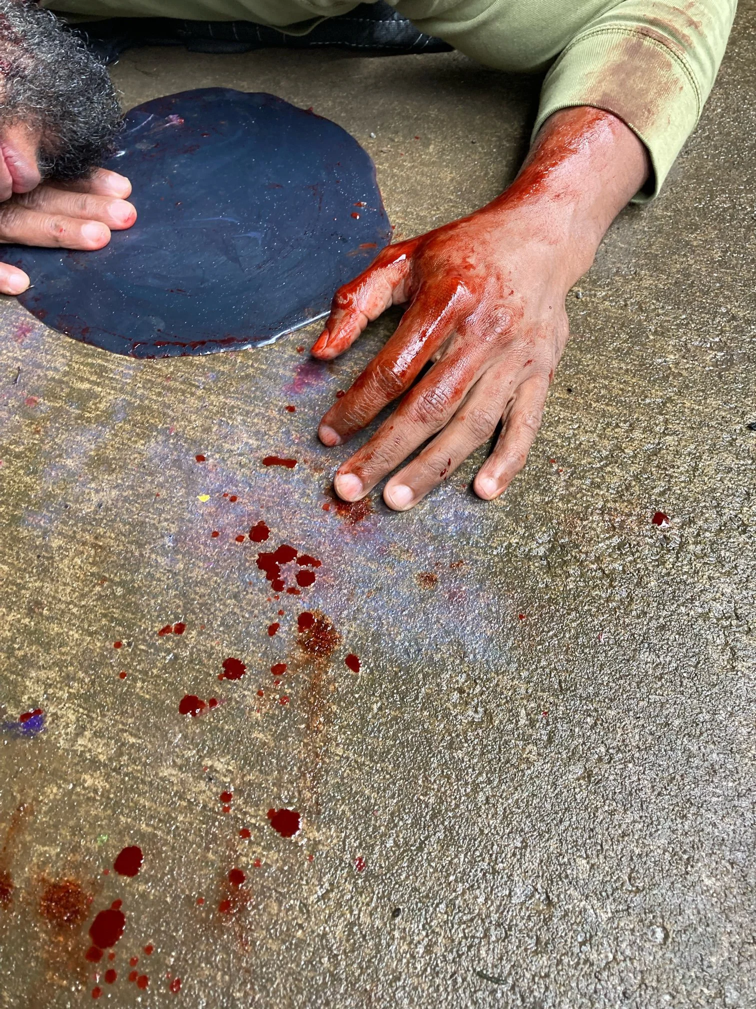 Bloody hand on gunshot victim in TO HAVE AND TO KILL