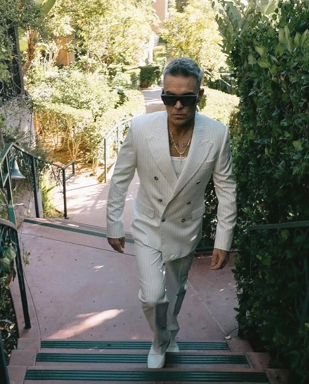  Robbie Williams attending 2024 Governors Awards