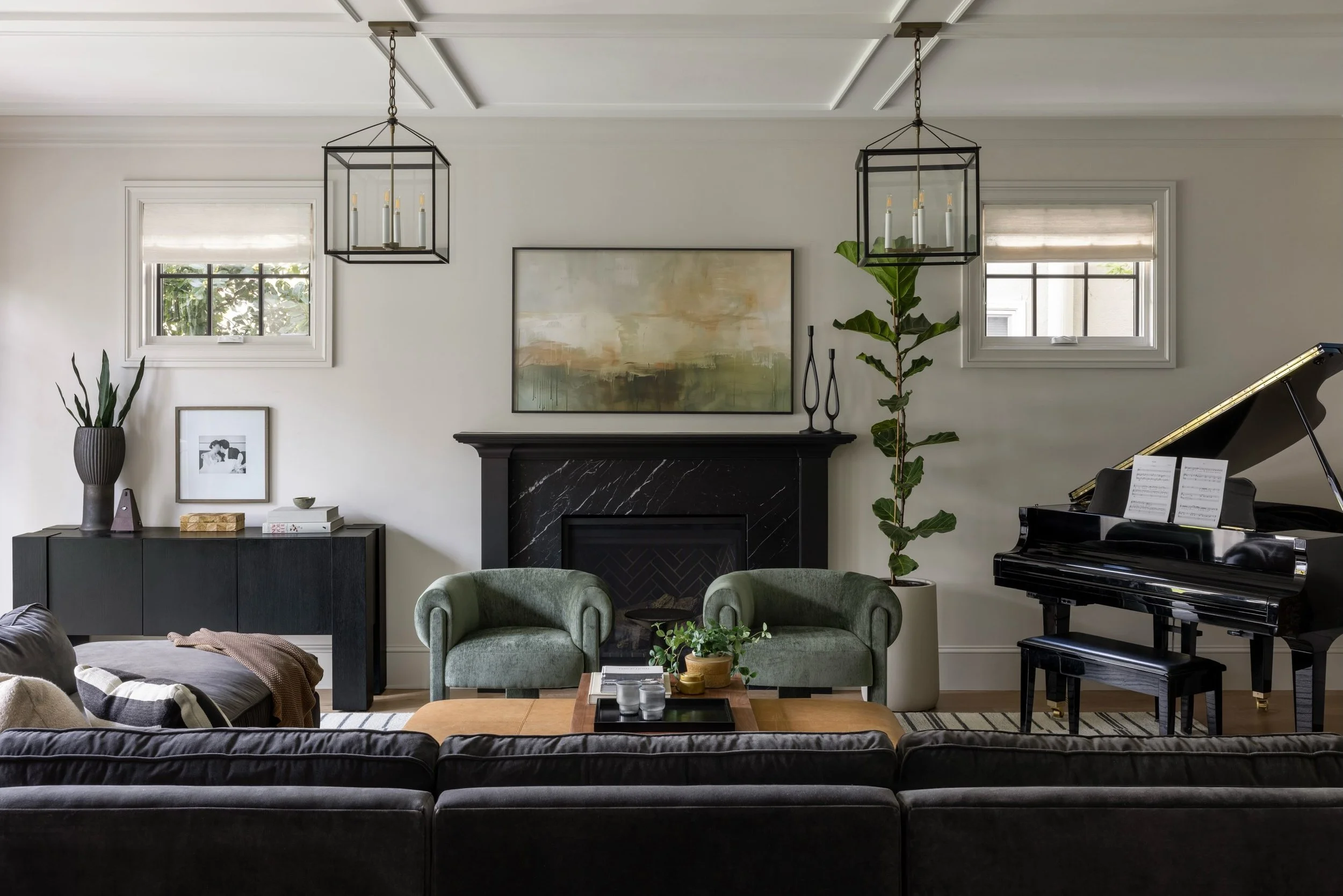 The family room of our Occidental project.

Big rooms don't need smaller furniture, they need bigger furniture and more of it.

Scale is everything. Generous seating, layered pieces, and furniture that fits the room are what transform a cavernous spa