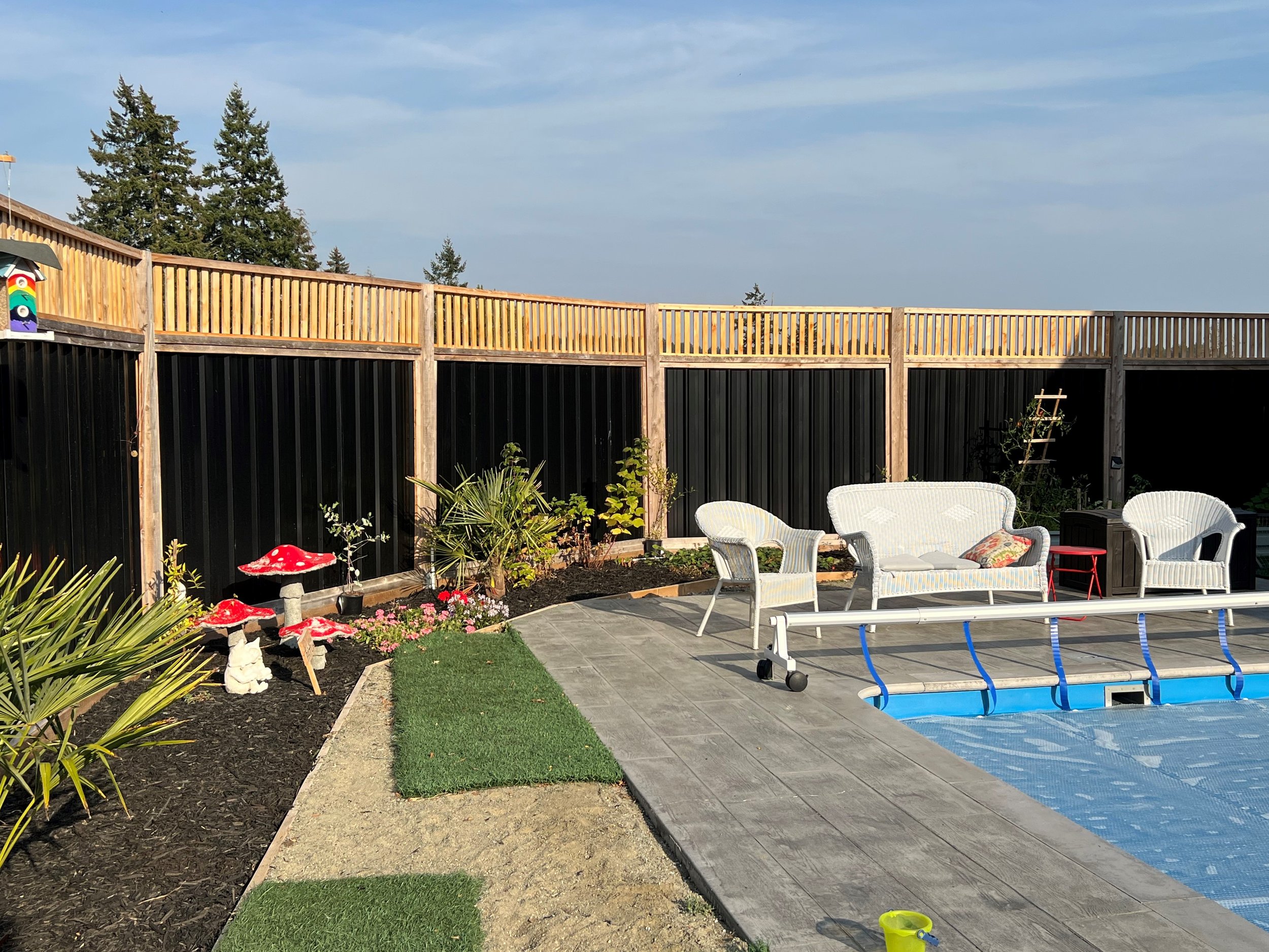 Corrugated Metal Fencing and Yellow Cedar