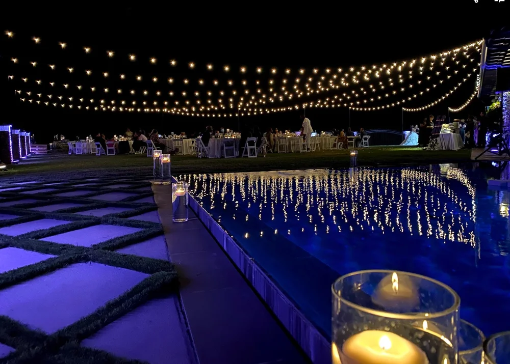 Starburst market lights over pool