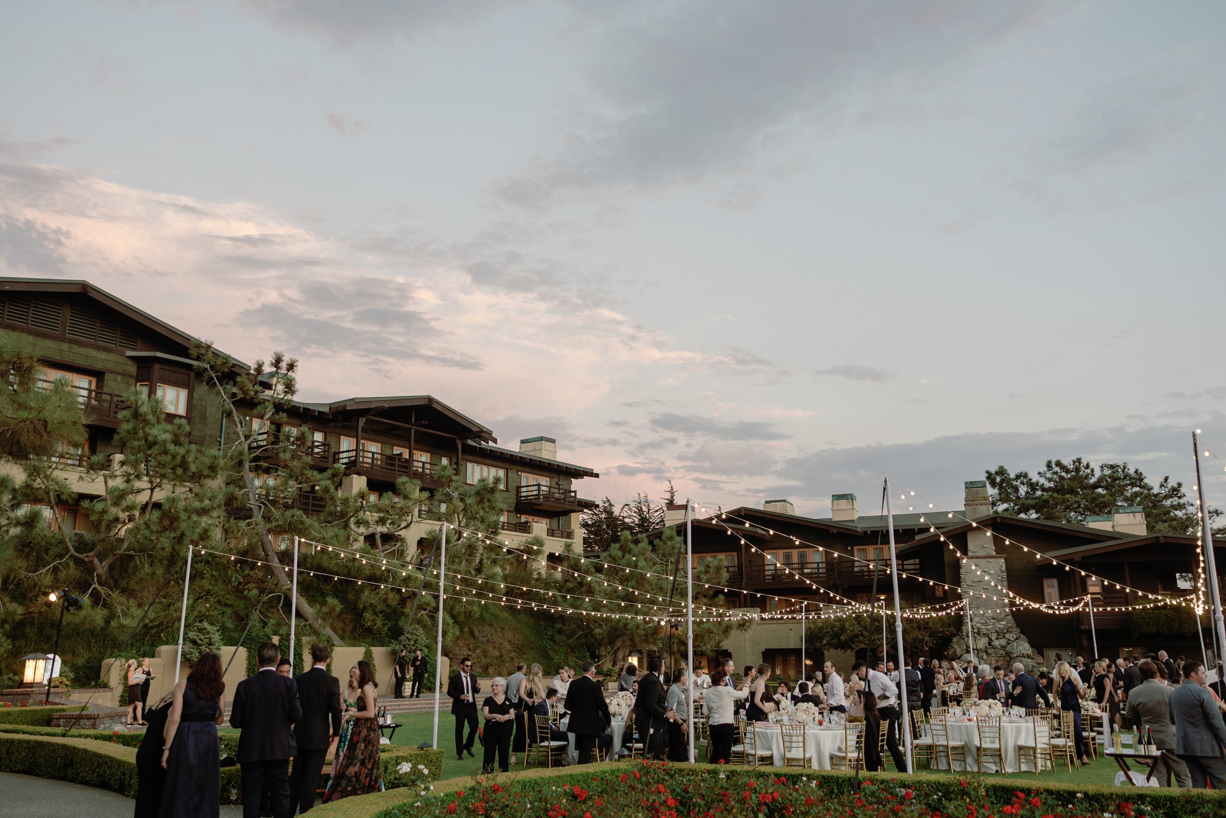 lodge-torrey-pines-wedding-cocktail-hour-cafe-lights-lodge-sunset.jpg