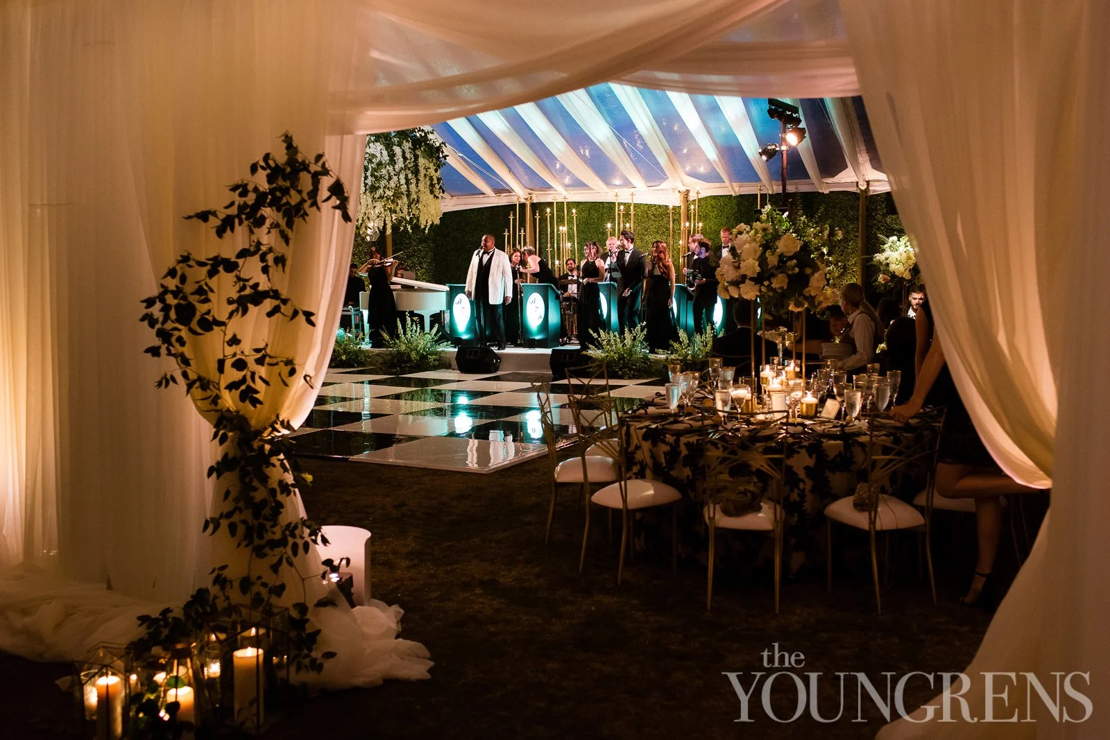 rancho-valencia-wedding-clear-top-tent-checkerboard-floor-band.jpg