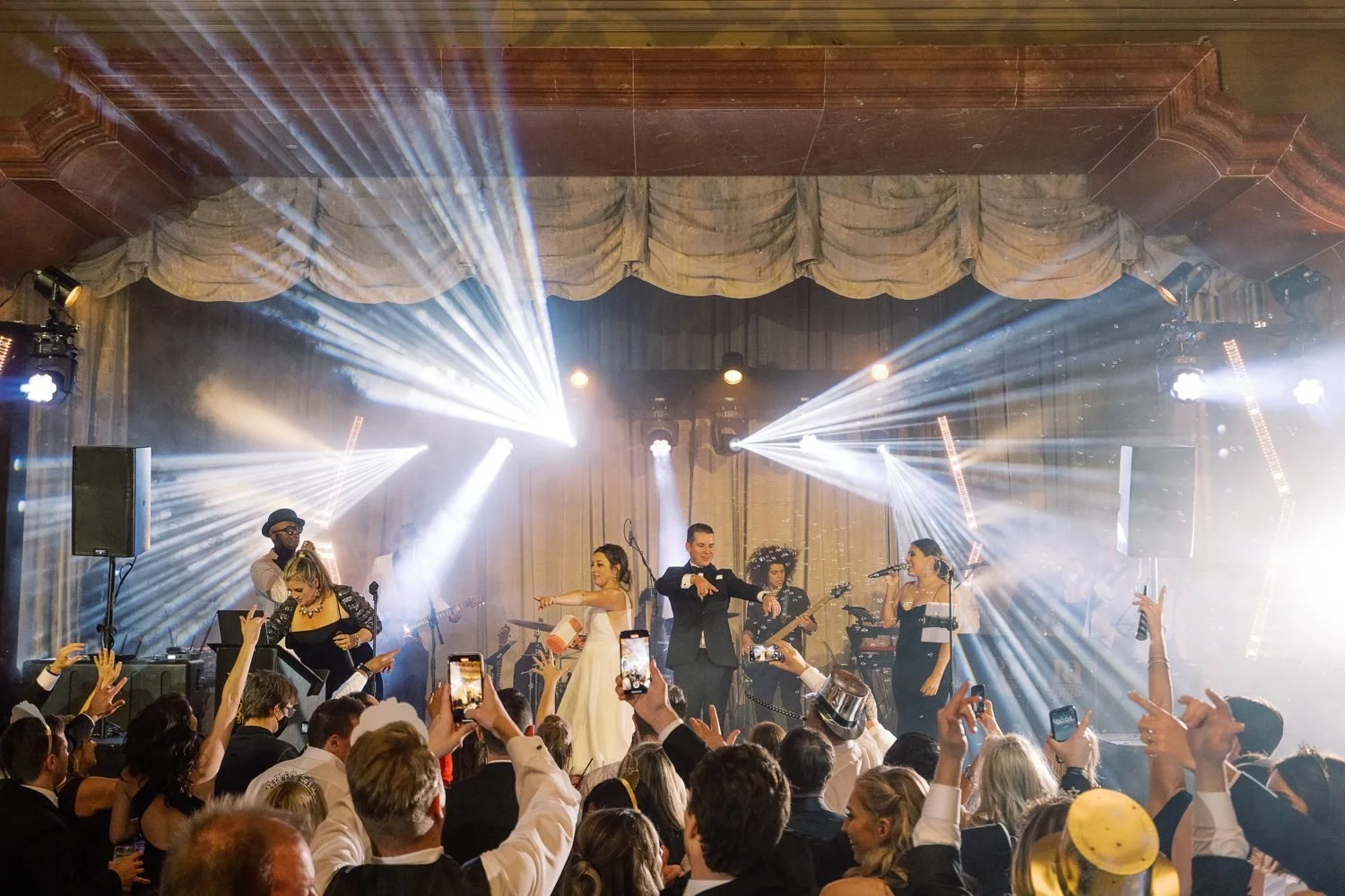 fairmont-grand-del-mar-wedding-band-stage-lighting-bride-groom.jpg