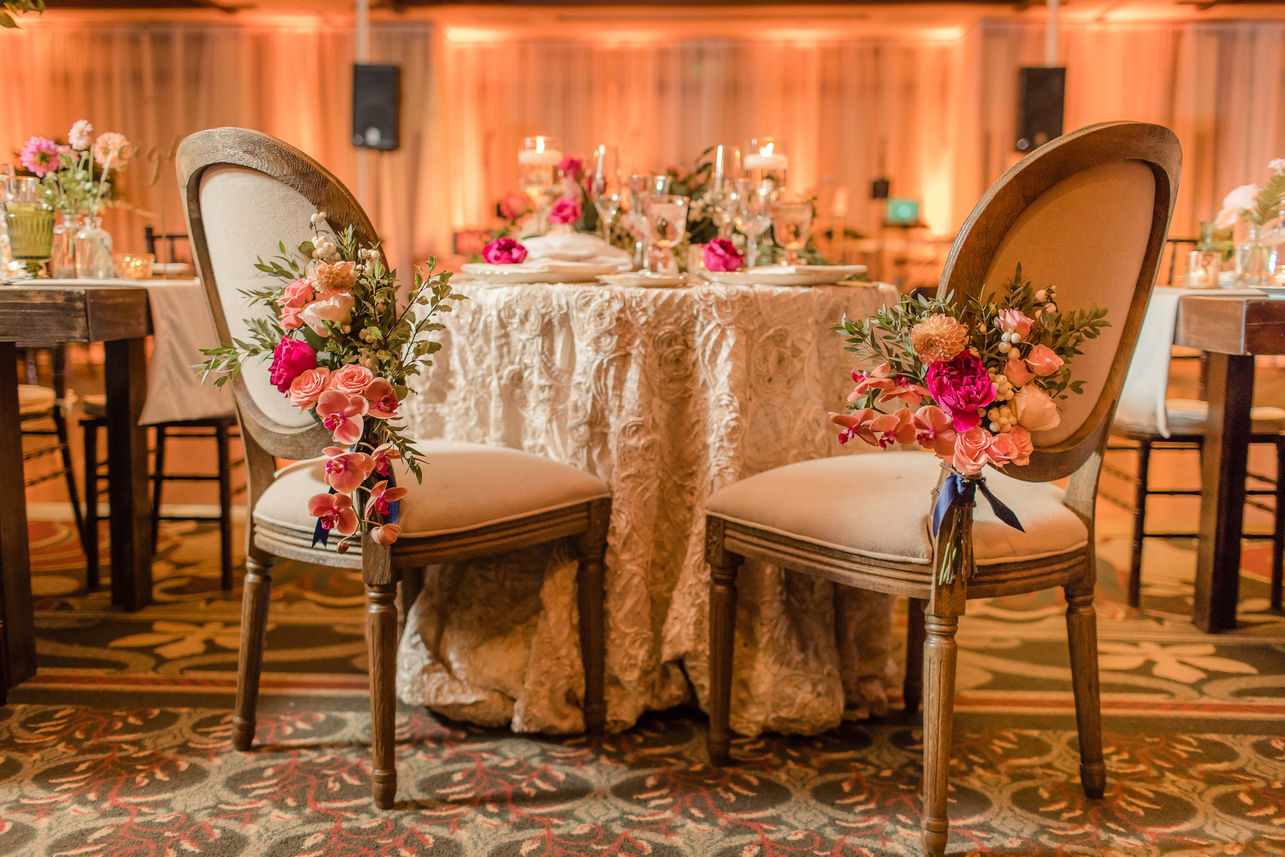 lodge-torrey-pines-wedding-peach-uplighting-draping-sweetheart-table.jpg