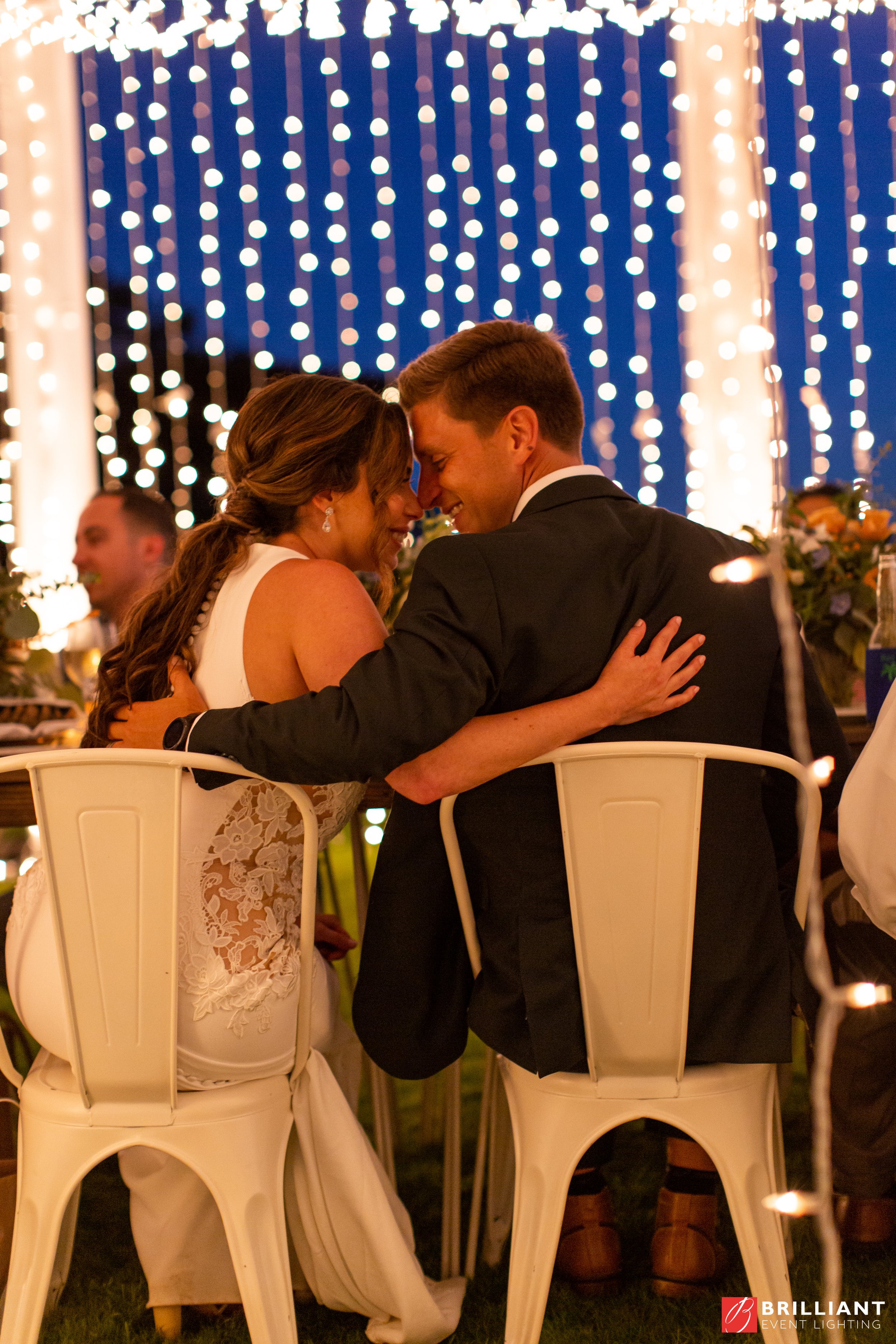 lodge-torrey-pines-wedding-arroyo-terrace-twinkle-light-wall-couple.jpg