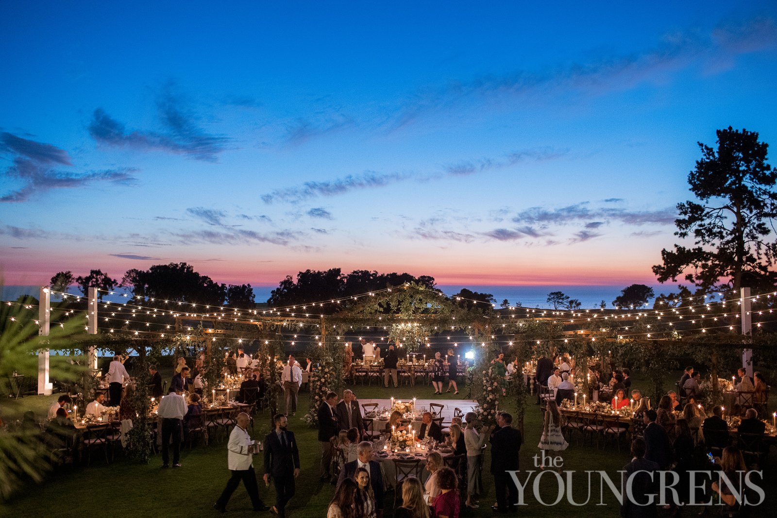 lodge-torrey-pines-wedding-cafe-lights-sunset-reception-wide-shot.jpg
