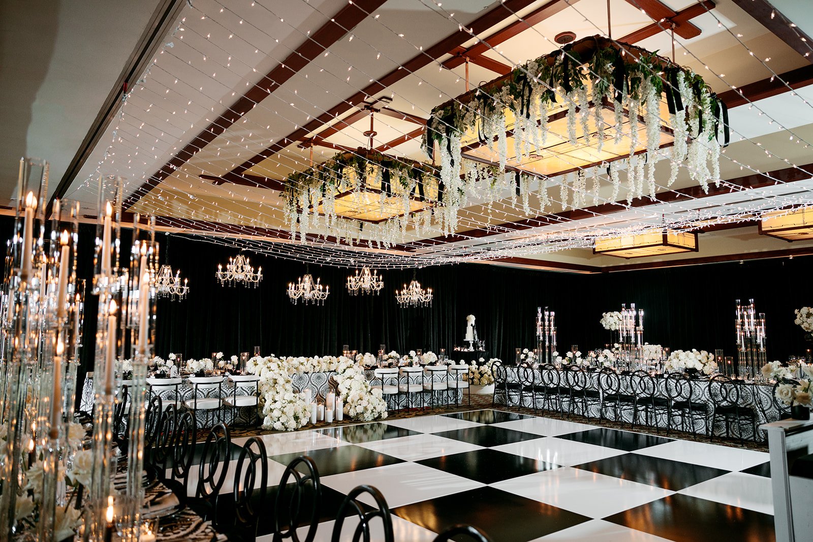 lodge-torrey-pines-wedding-checkerboard-dance-floor-floral-chandeliers.jpg