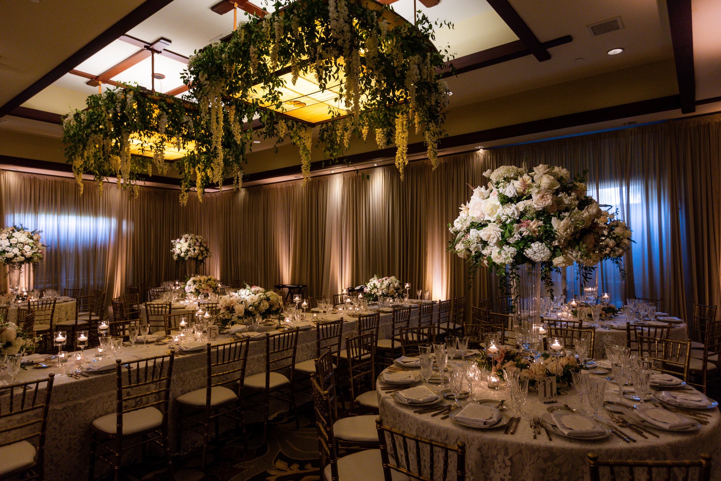 lodge-torrey-pines-wedding-hanging-floral-chandelier-installation-banquet-tables.jpg