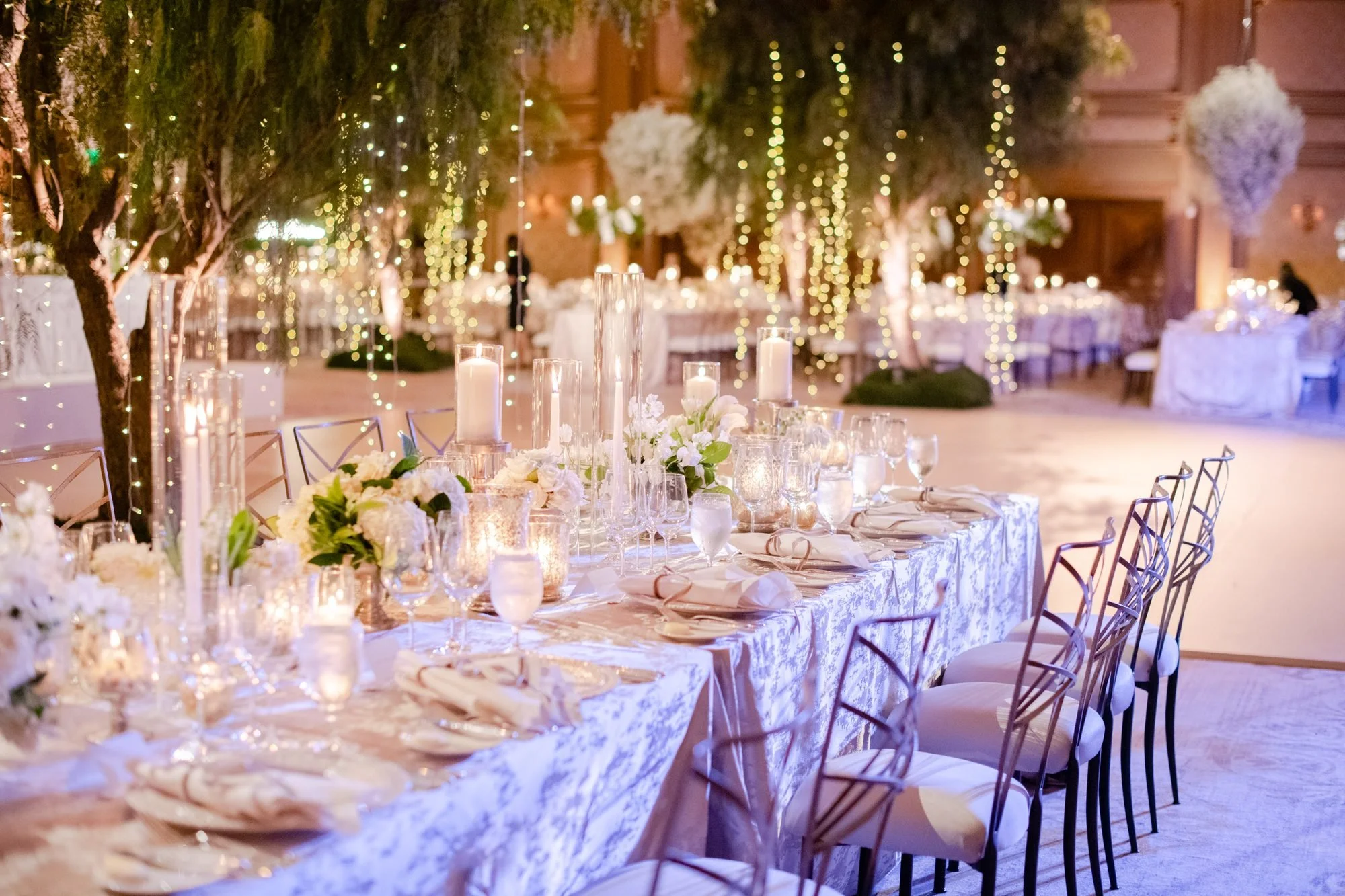 fairmont-grand-del-mar-wedding-fairy-light-trees-amber-uplighting.jpg
