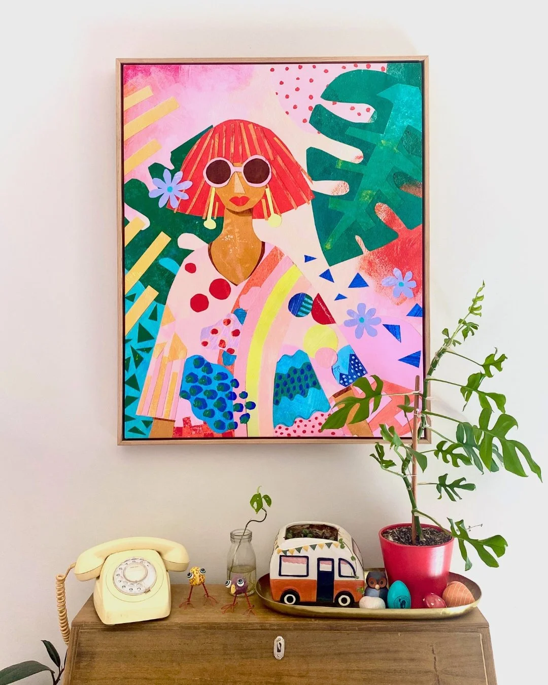 wall art print of woman with red hair on pink background