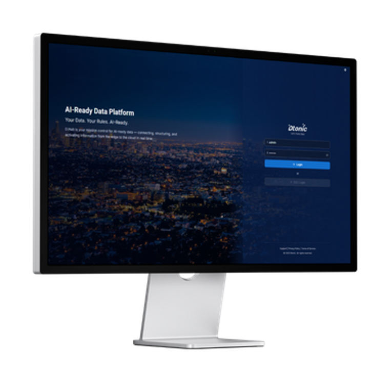 Computer monitor displaying a login screen for an AI data platform with a cityscape background at dusk.