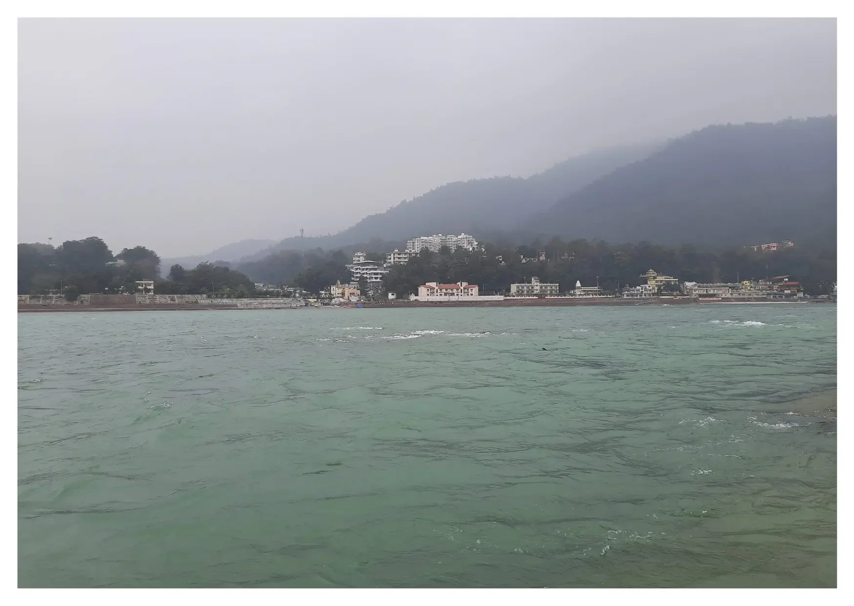 Fog blankets the valley and icy waters of the Ganga compete with the nip in the air as Rishikesh moves under its colderst during December - January.