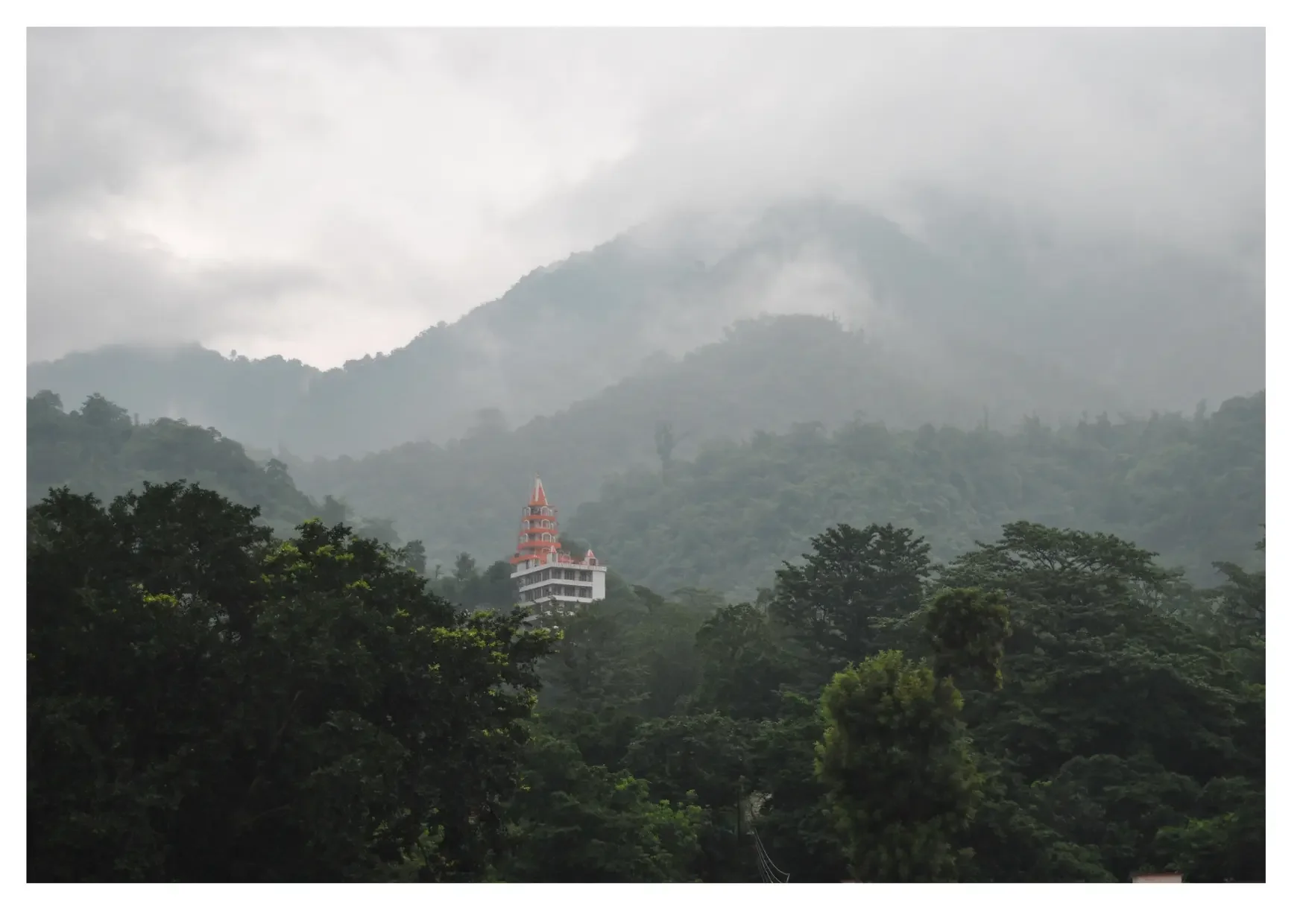 Pictured: Bhootnath Temple as seen from Swargashram. Monsoon is when the river is at its mightiest and the mountains are at their liveliest.