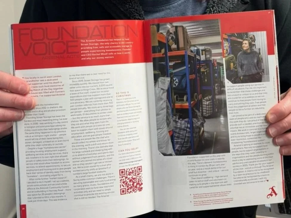 Simon holding article.jpg