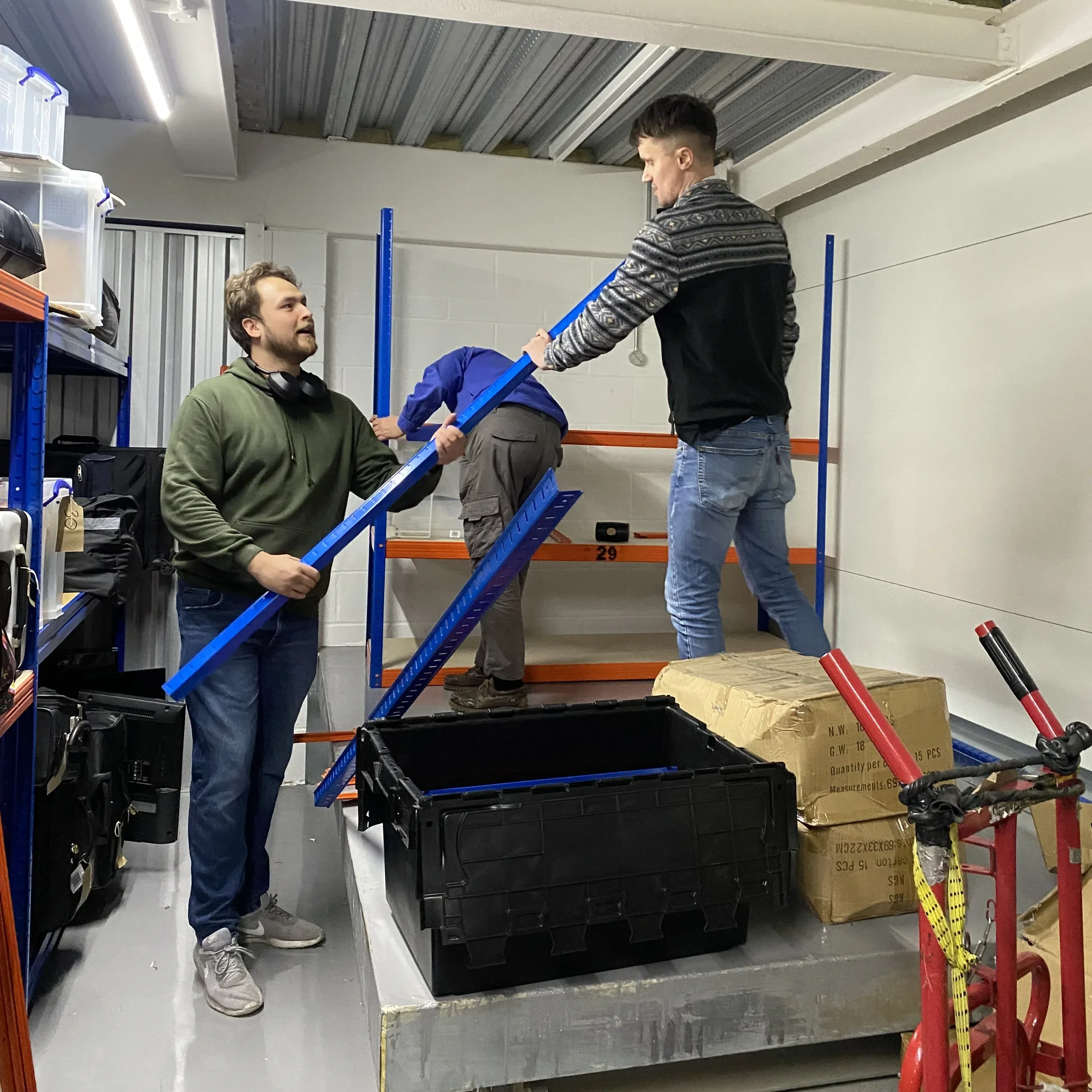 The Cavendish Wares team building shelves.