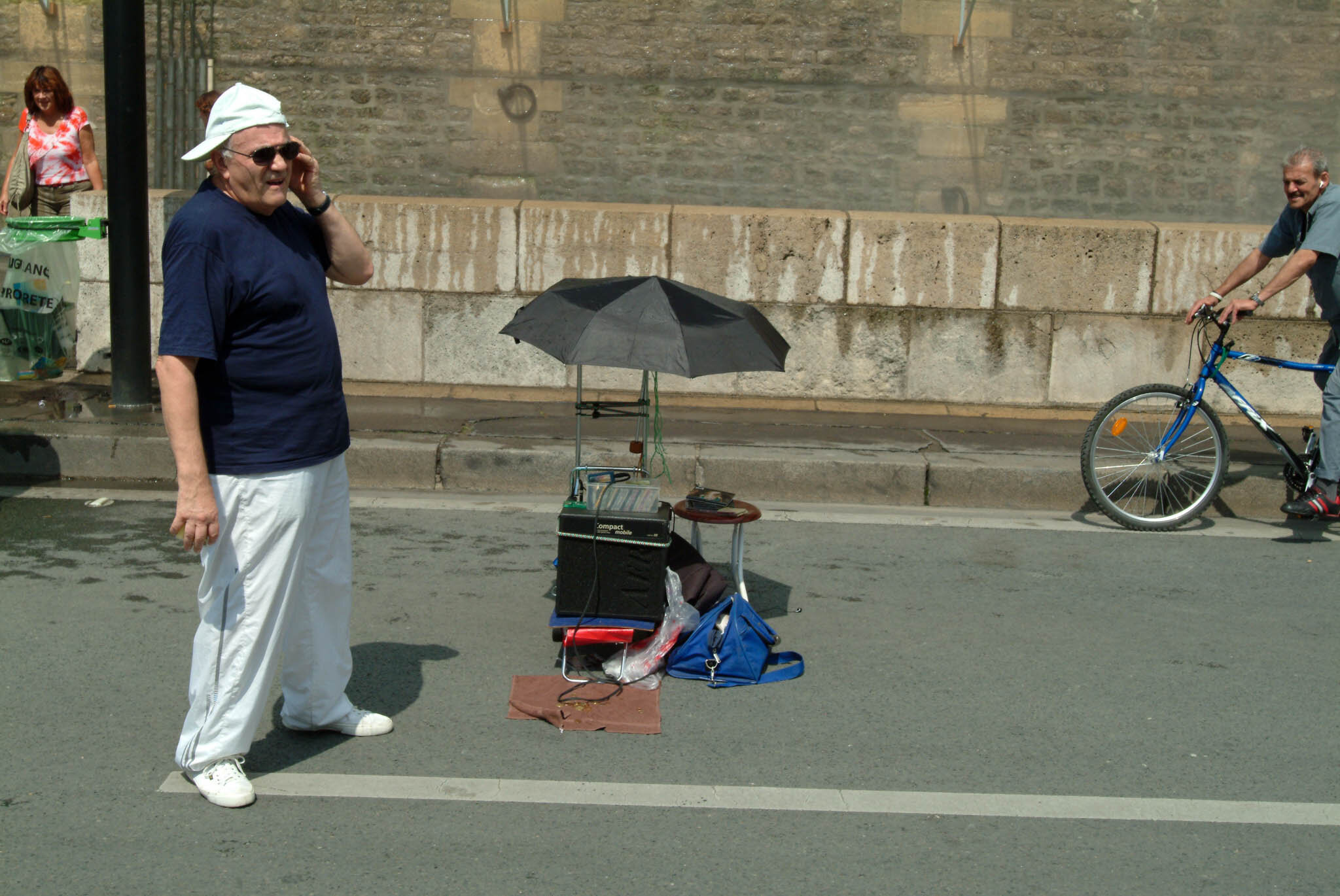    ‘Paris/NYC’ Book ‘Edition Lammerhuber’    Man playing music at Paris Plage. 