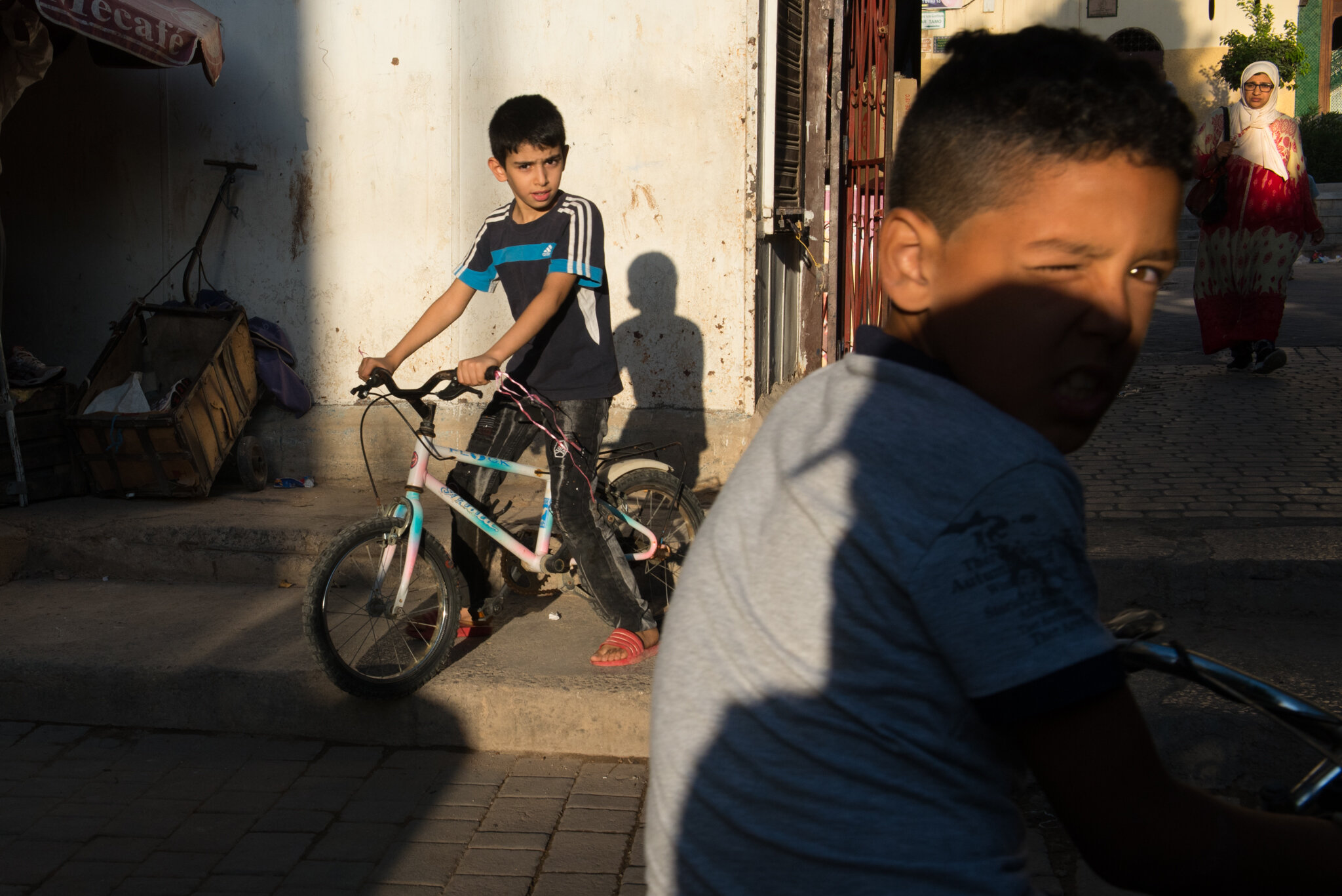    Morocco - Fes     Boys riding bikes.  