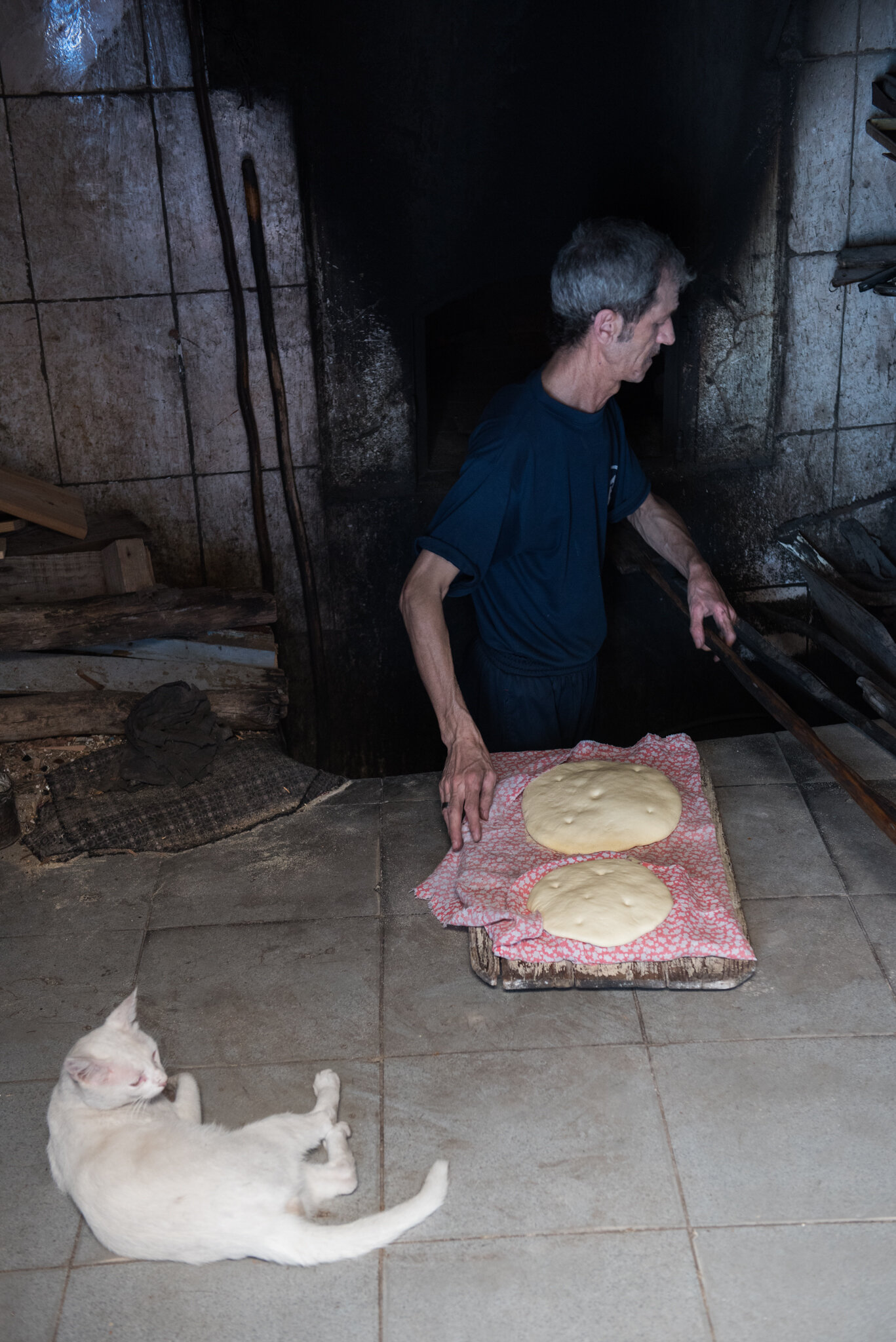    Morocco - Tanger     Man baking bread. Kasbah 