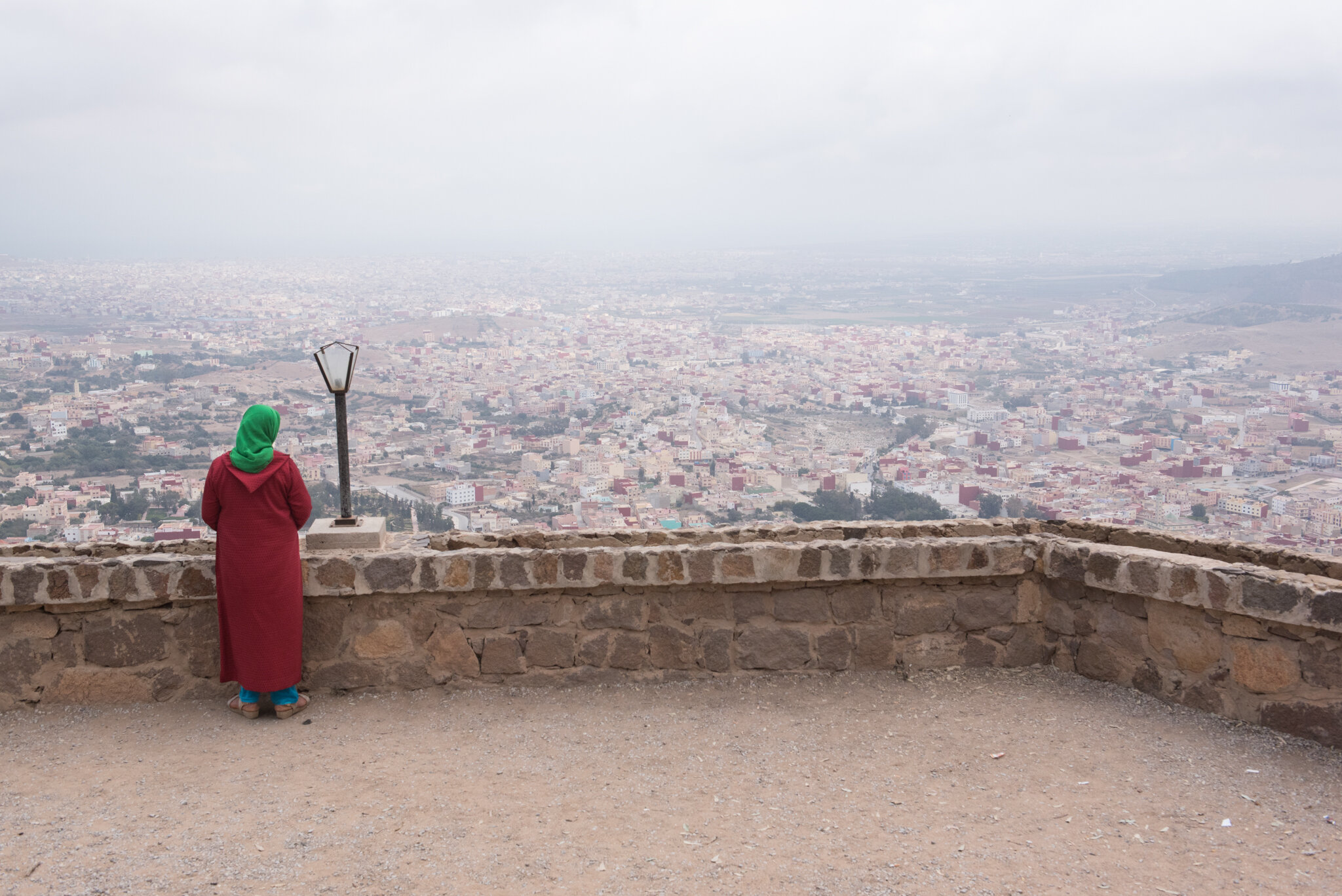   Morocco - Nador     Moroccan lady looking out towards Nador from nearby mountains 