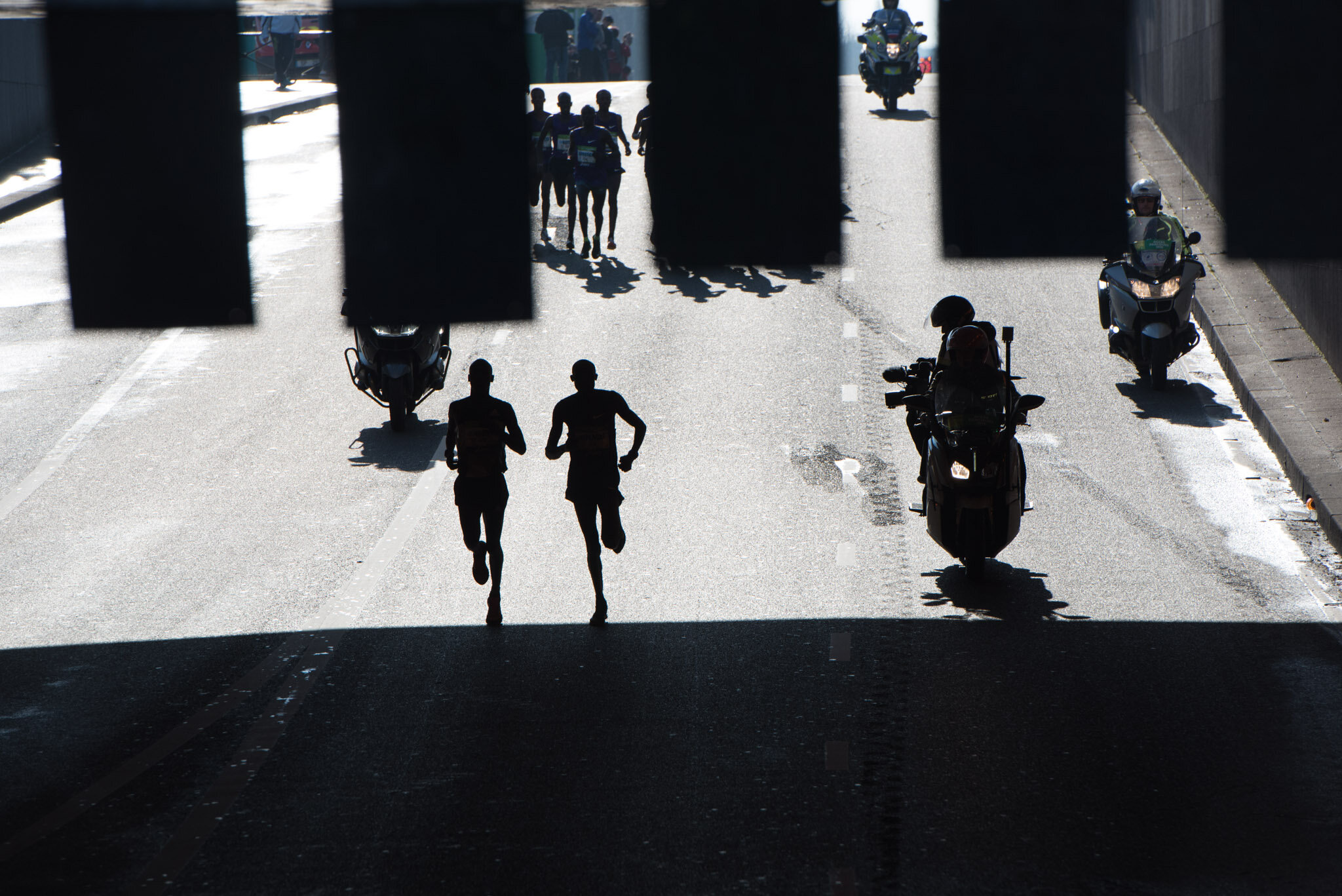    Paris Marathon for Schneider Electric    Leaders running through tunnel by Louvre 