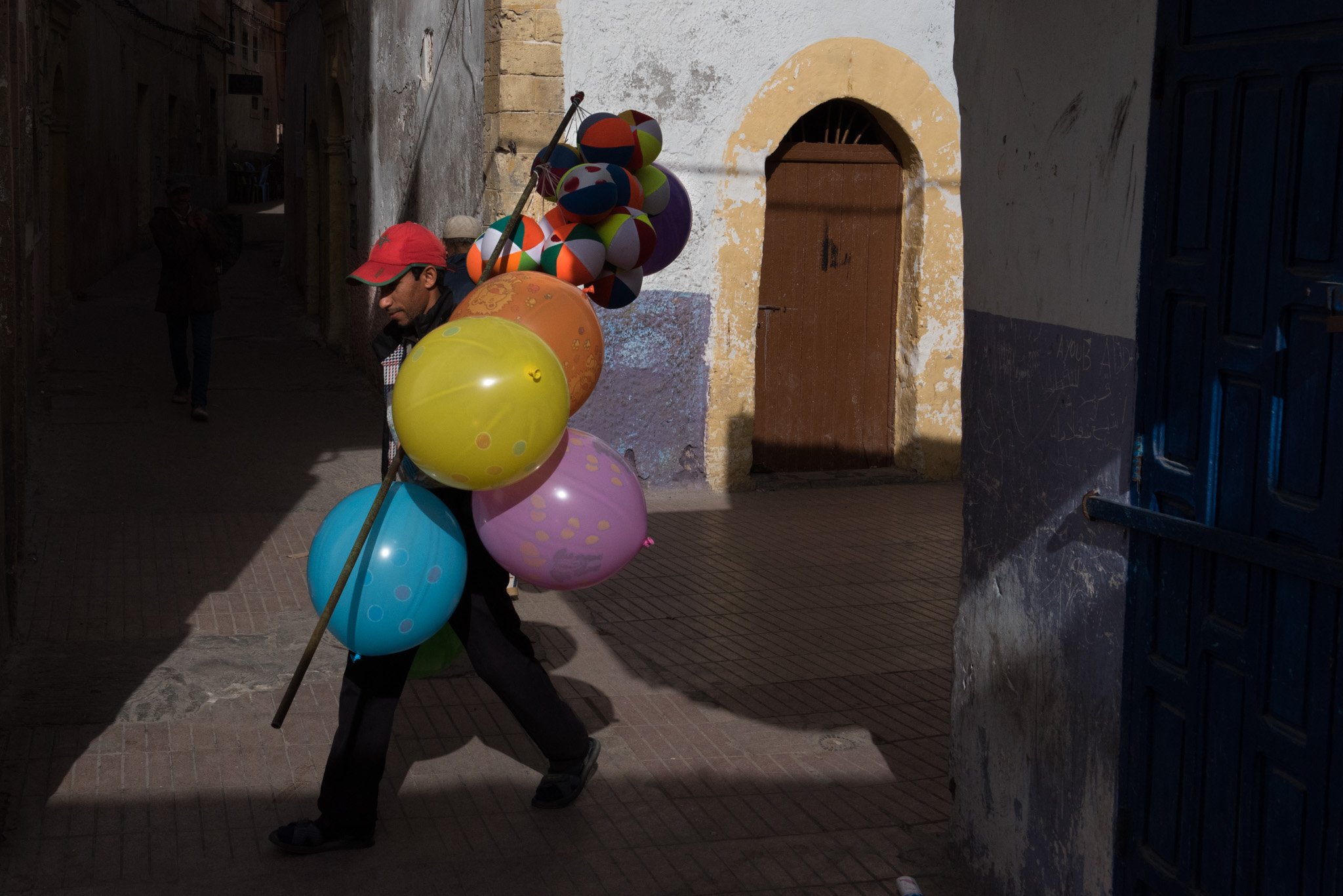    Morocco - Essaouira    Man selling balloons and balls 