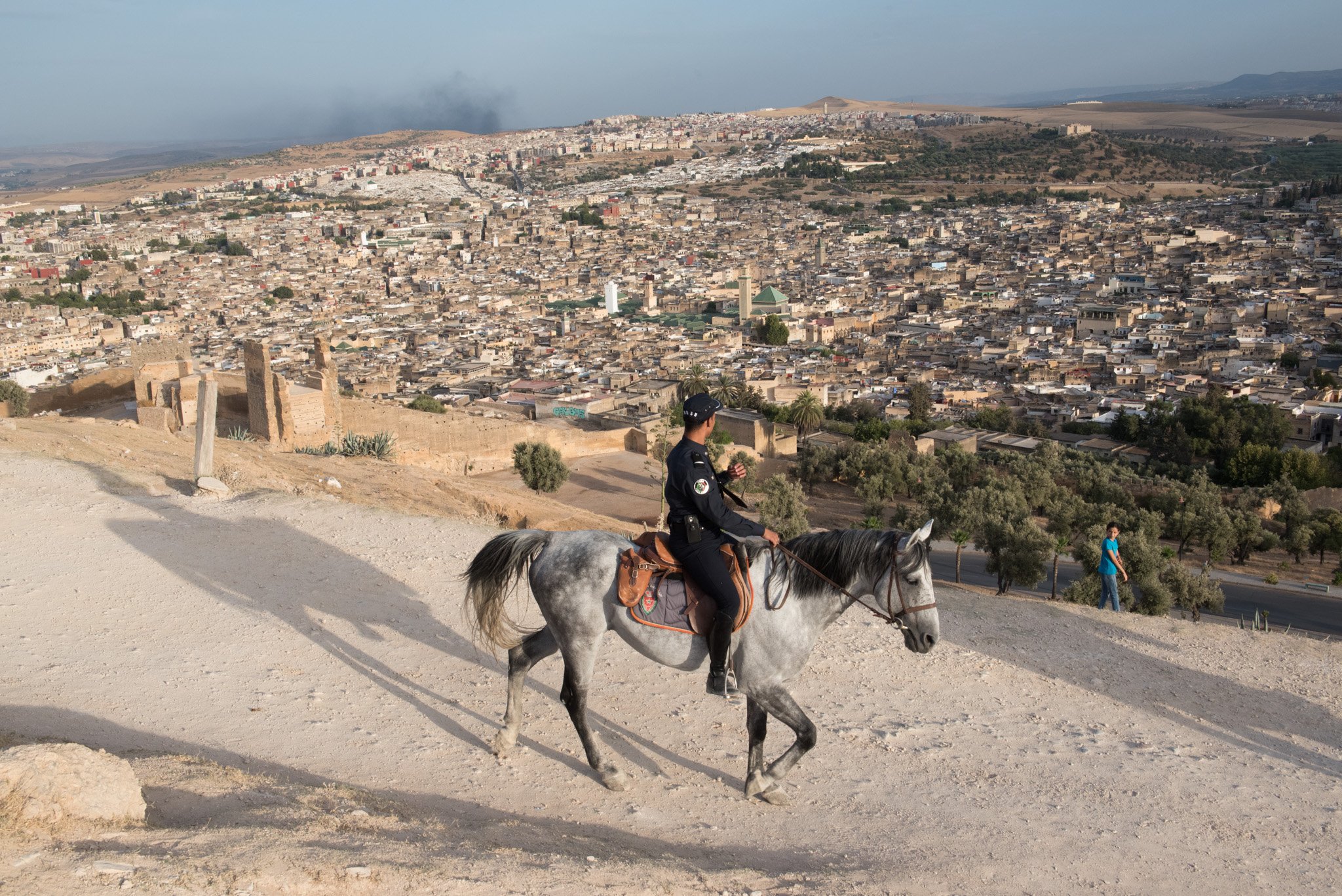    Morocco - Fes    Policeman on horse protecting ancient site 