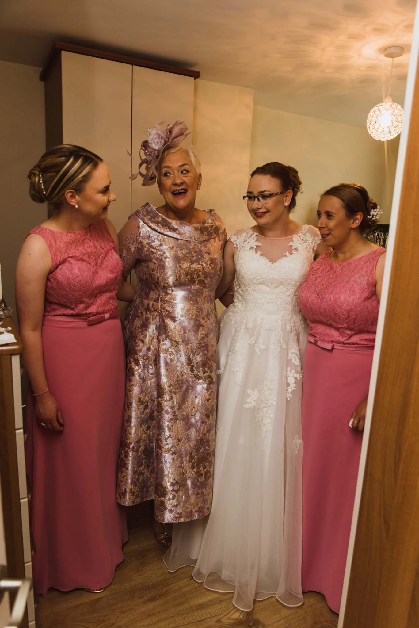 The bridal party beside eachother.