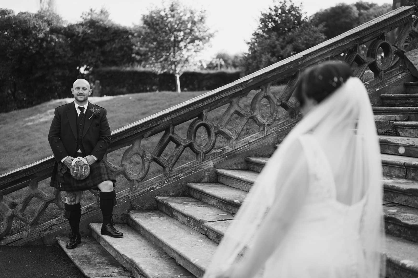  portrait of groom on steps 