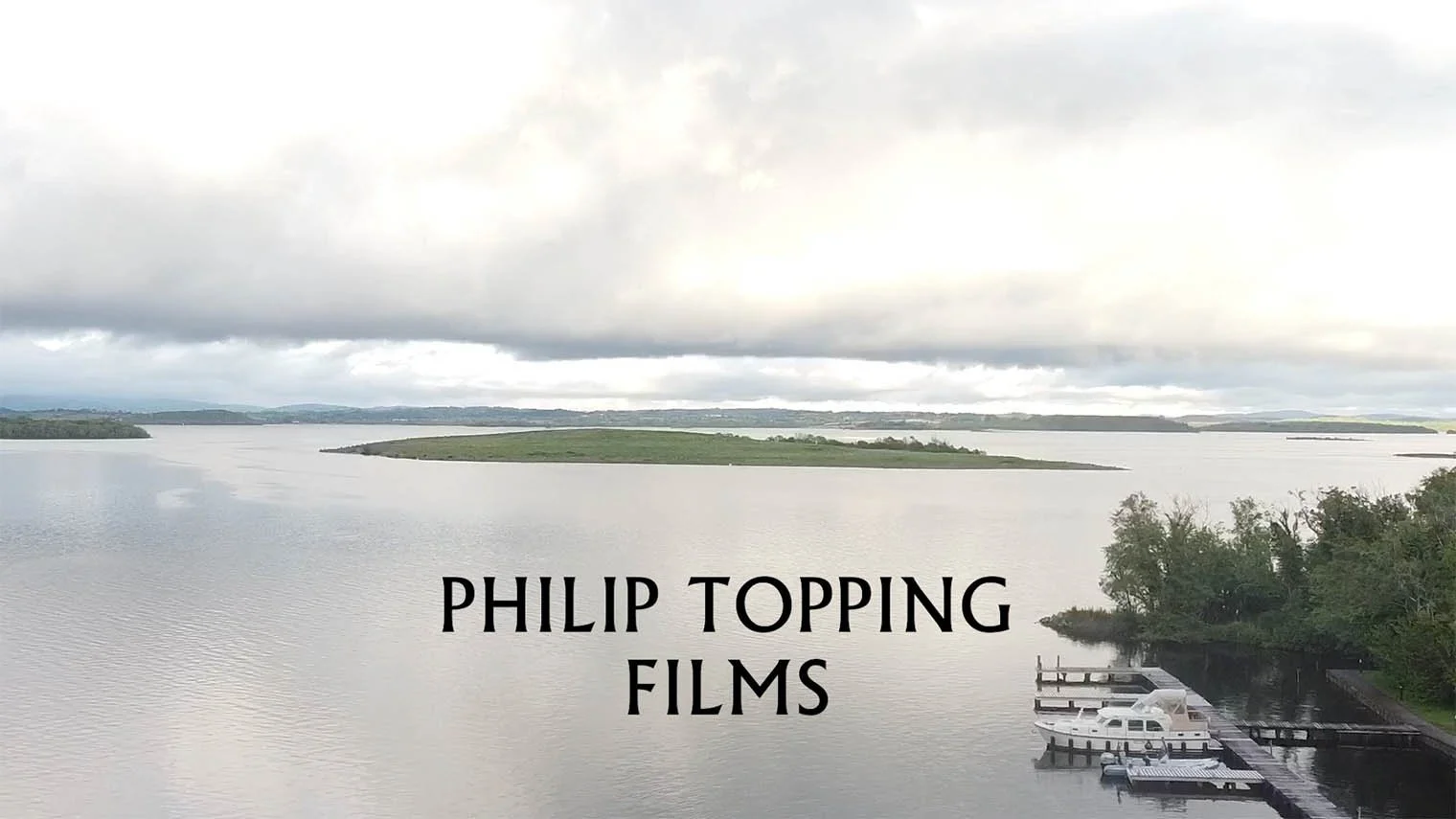 Bird's-eye view looking down at the boats and shore.