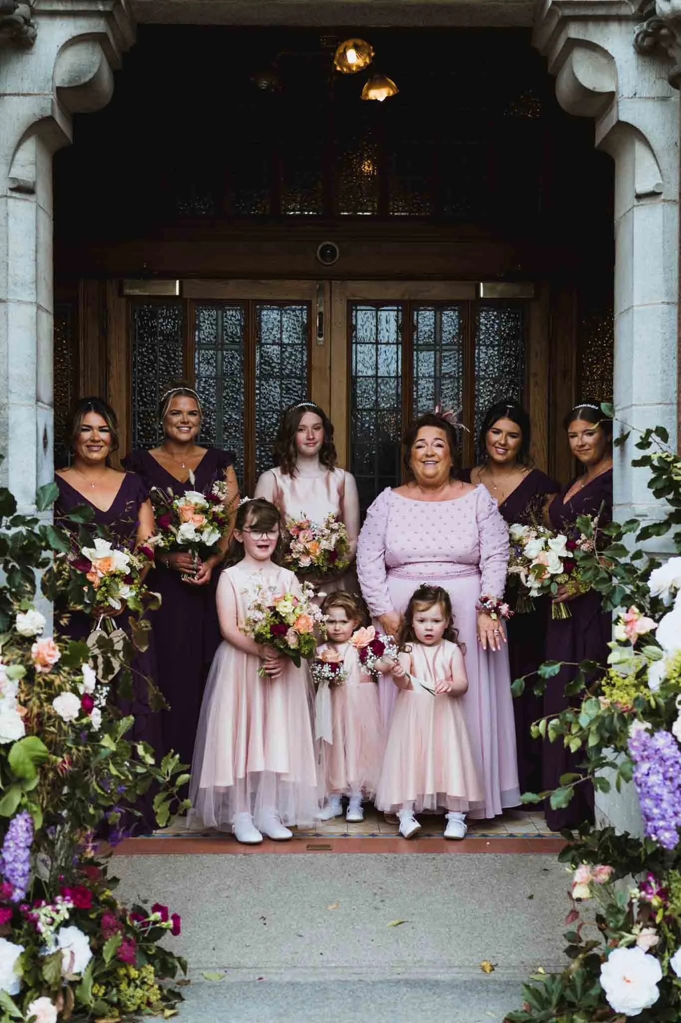 Birdal party at the front of the church for a quick photo.